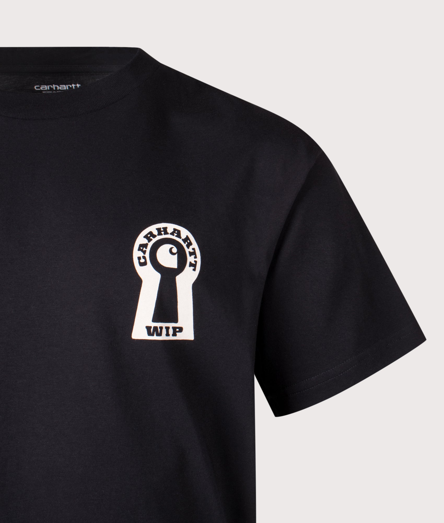 Carhartt WIP Loose Fit Locked T-Shirt in Black at EQVVS Menswear. Detail shot.