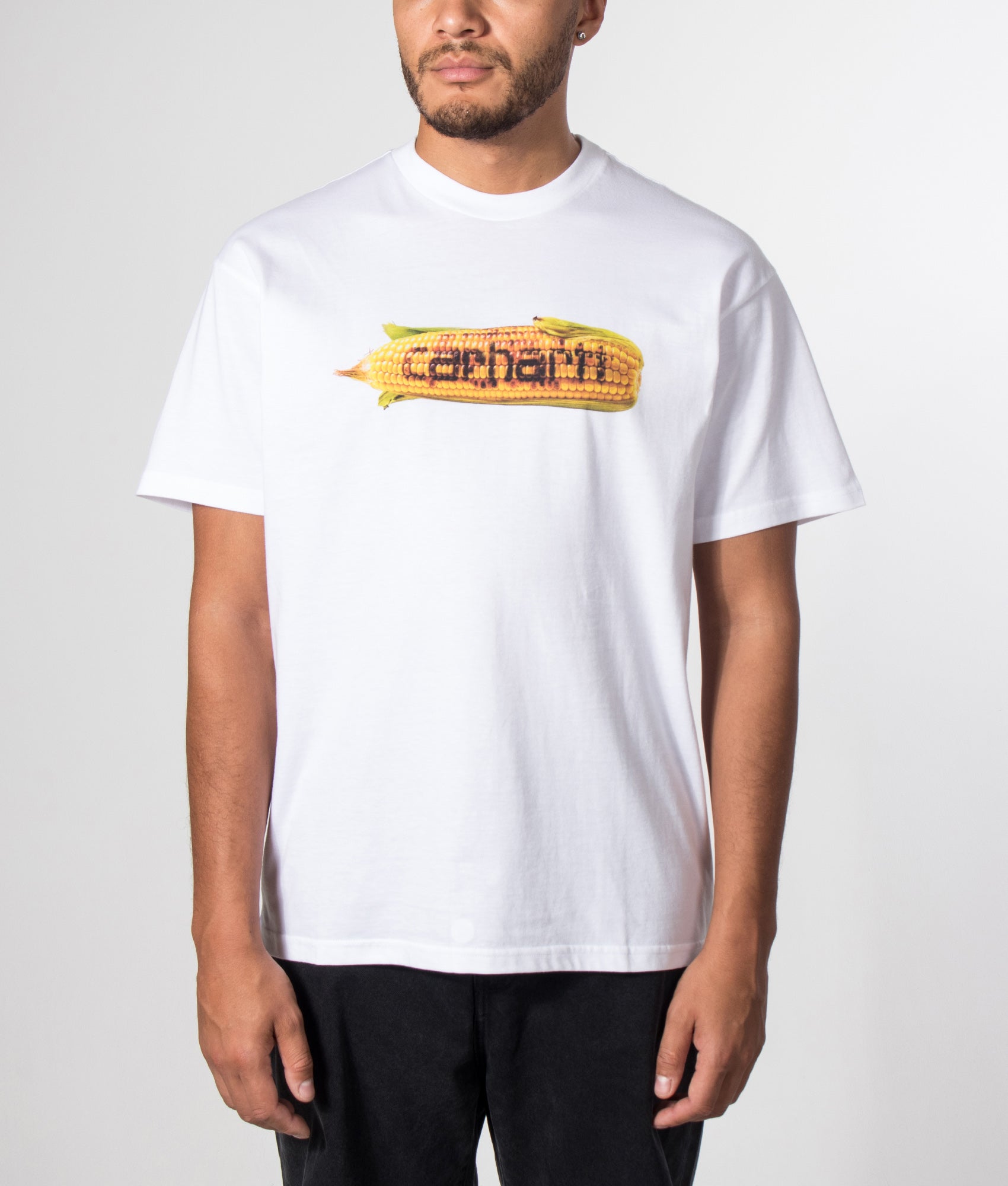 Carhartt WIP Loose Fit Hot Cob T-Shirt in White at EQVVS Menswear. Model front shot.