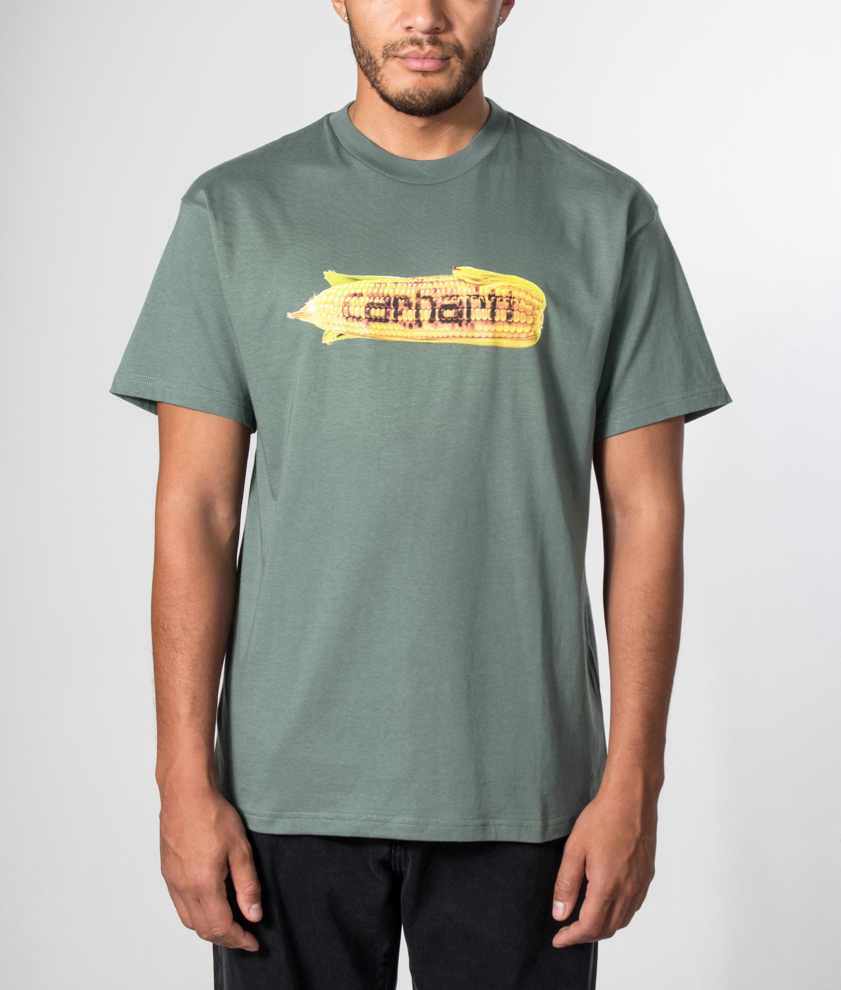 Carhartt WIP Loose Fit Hot Cob T-Shirt in Velvet Green at EQVVS Menswear. Model front shot.