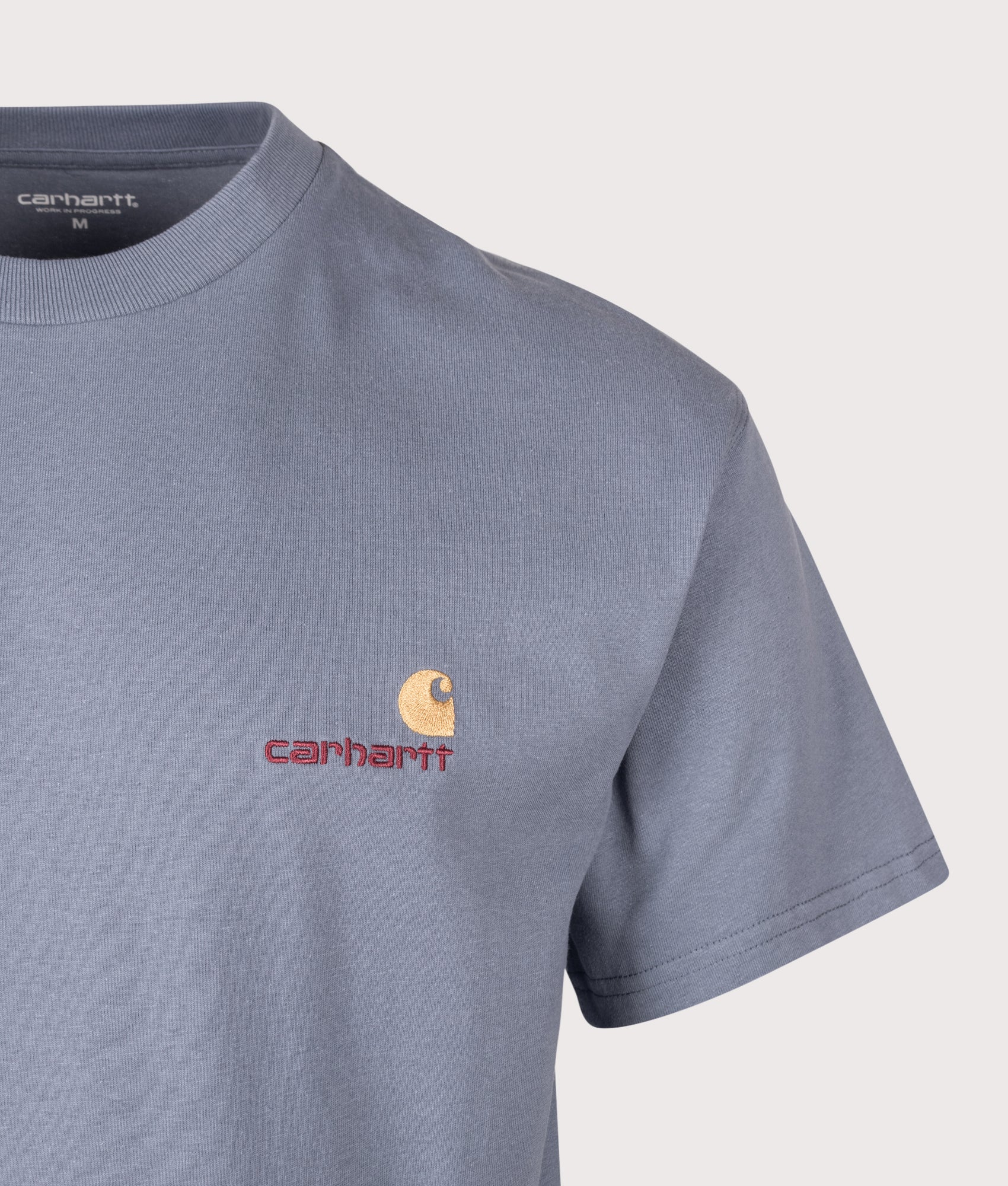 Carhartt WIP Loose Fit American Script T-Shirt in Shady Blue at EQVVS Menswear. Detail shot.
