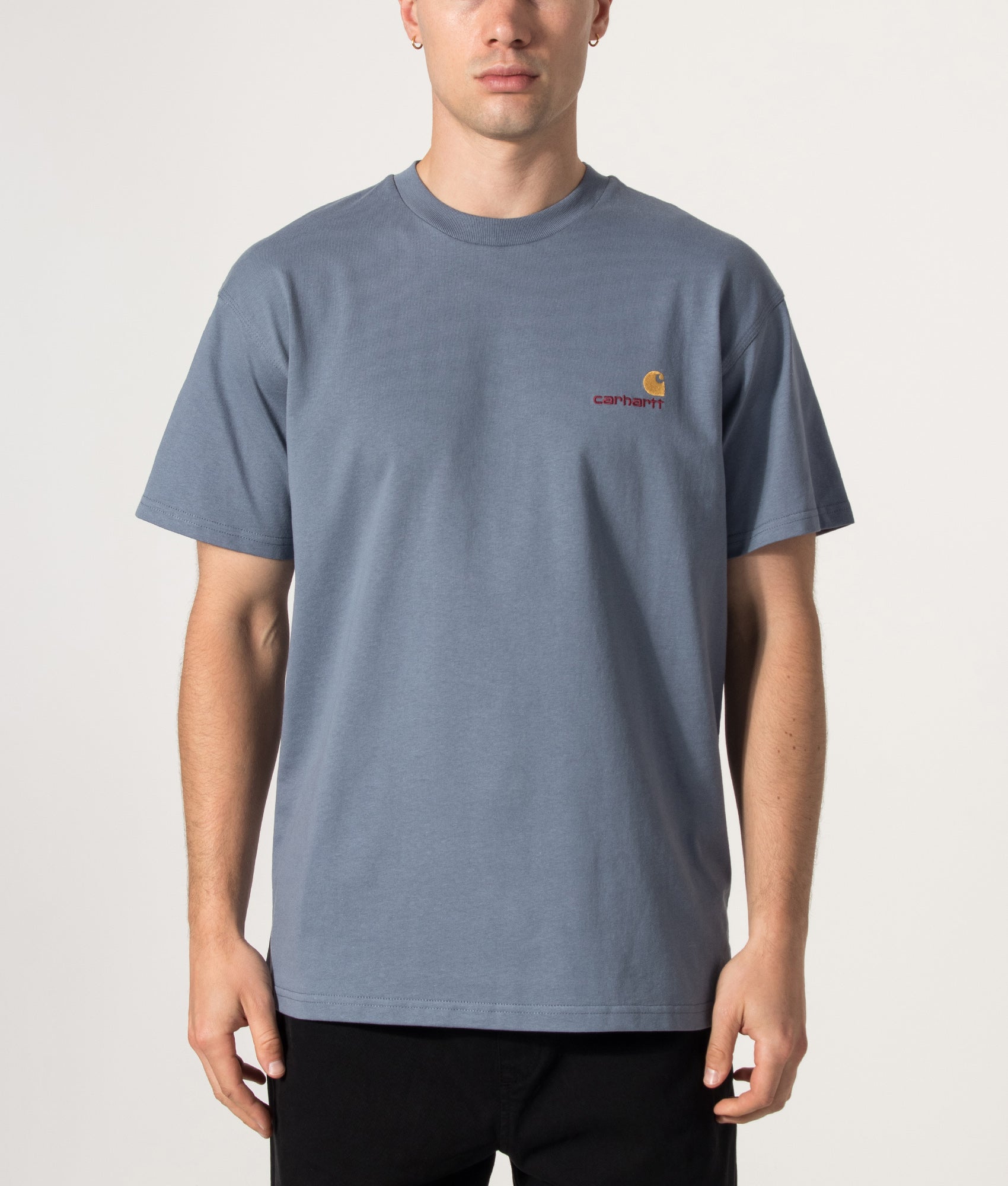 Carhartt WIP Loose Fit American Script T-Shirt in Shady Blue at EQVVS Menswear. Model front shot.