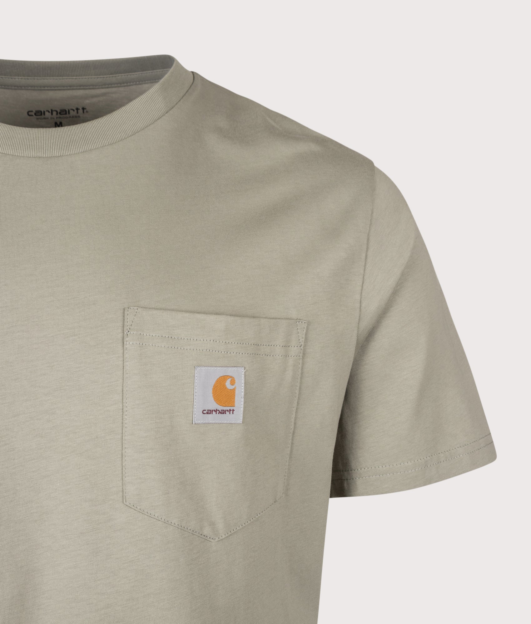 Carhartt WIP Pocket T-Shirt in Shady Green at EQVVS Menswear. Detail shot.