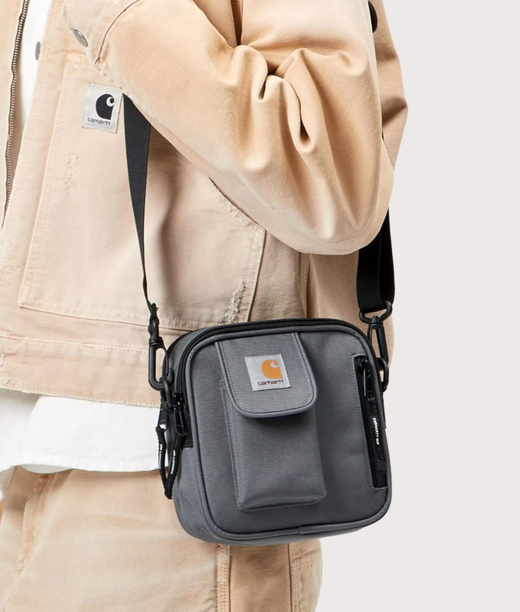 Carhartt WIP Essentials Bag in Styx at EQVVS Menswear. Model shot.