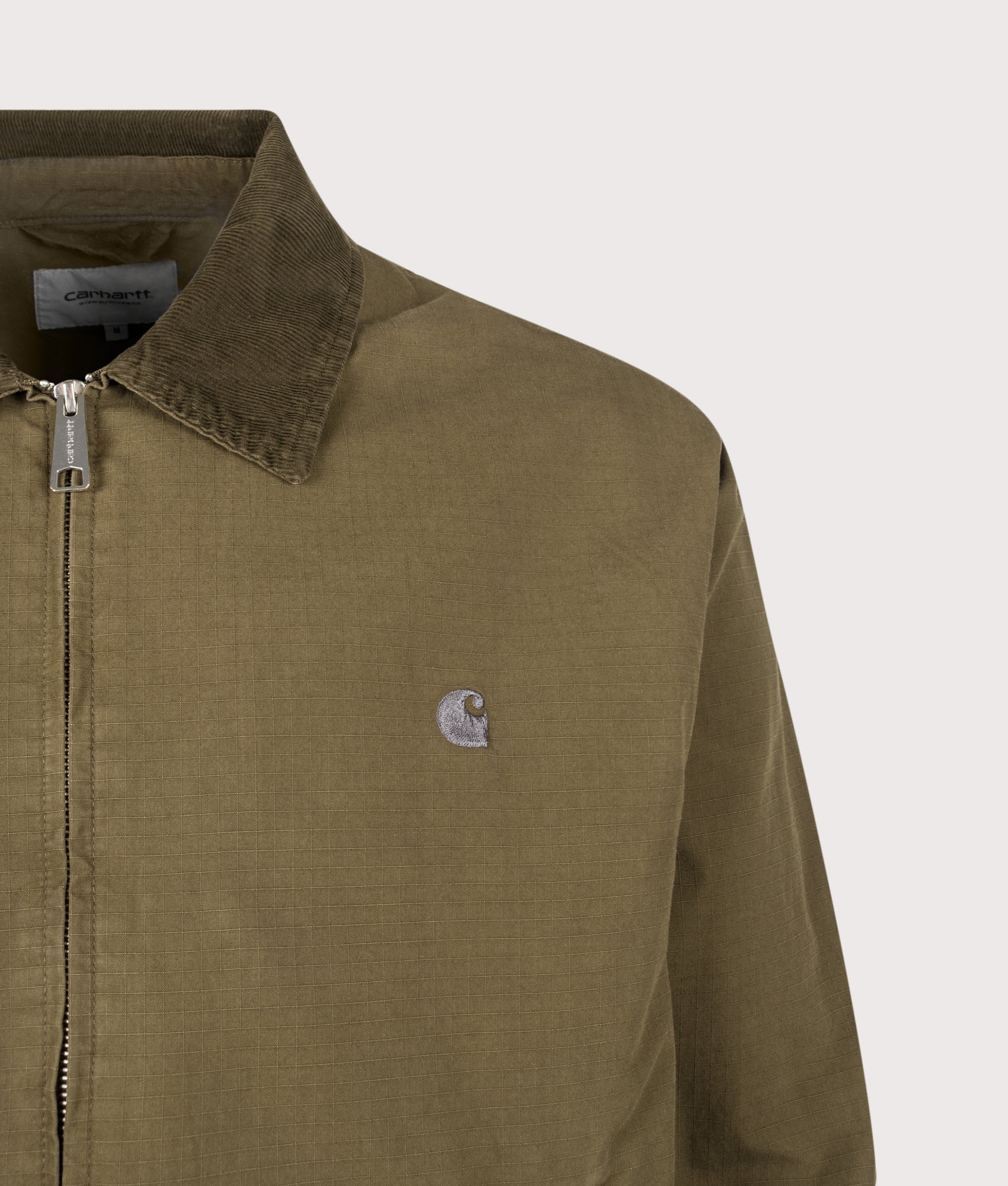 Carhartt WIP Madison Ripstop Jacket in Dark Beech and Black at EQVVS Menswear. Detail shot.