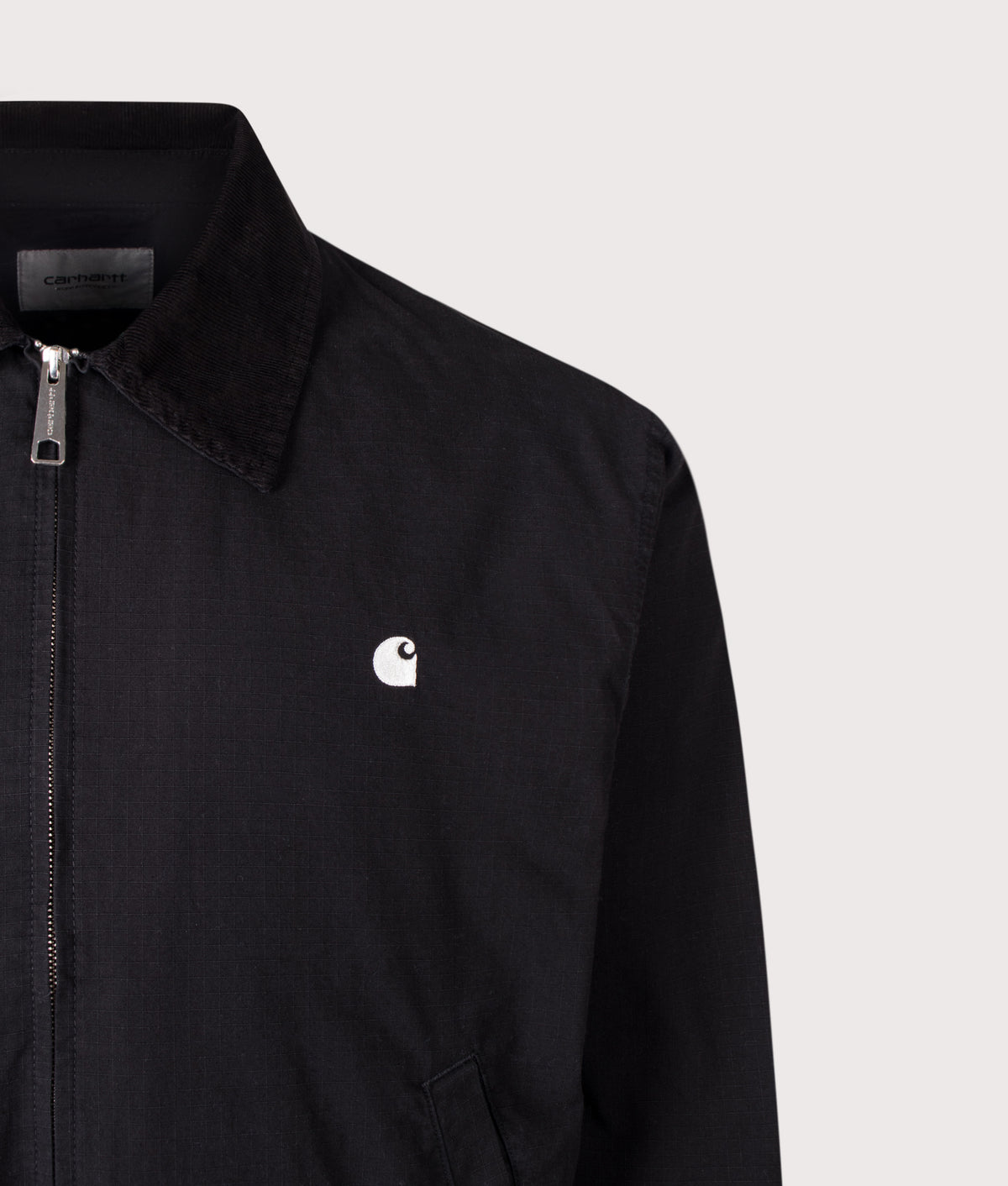 Carhartt WIP Madison Ripstop Jacket in Black and Wax at EQVVS Menswear. Detail shot.
