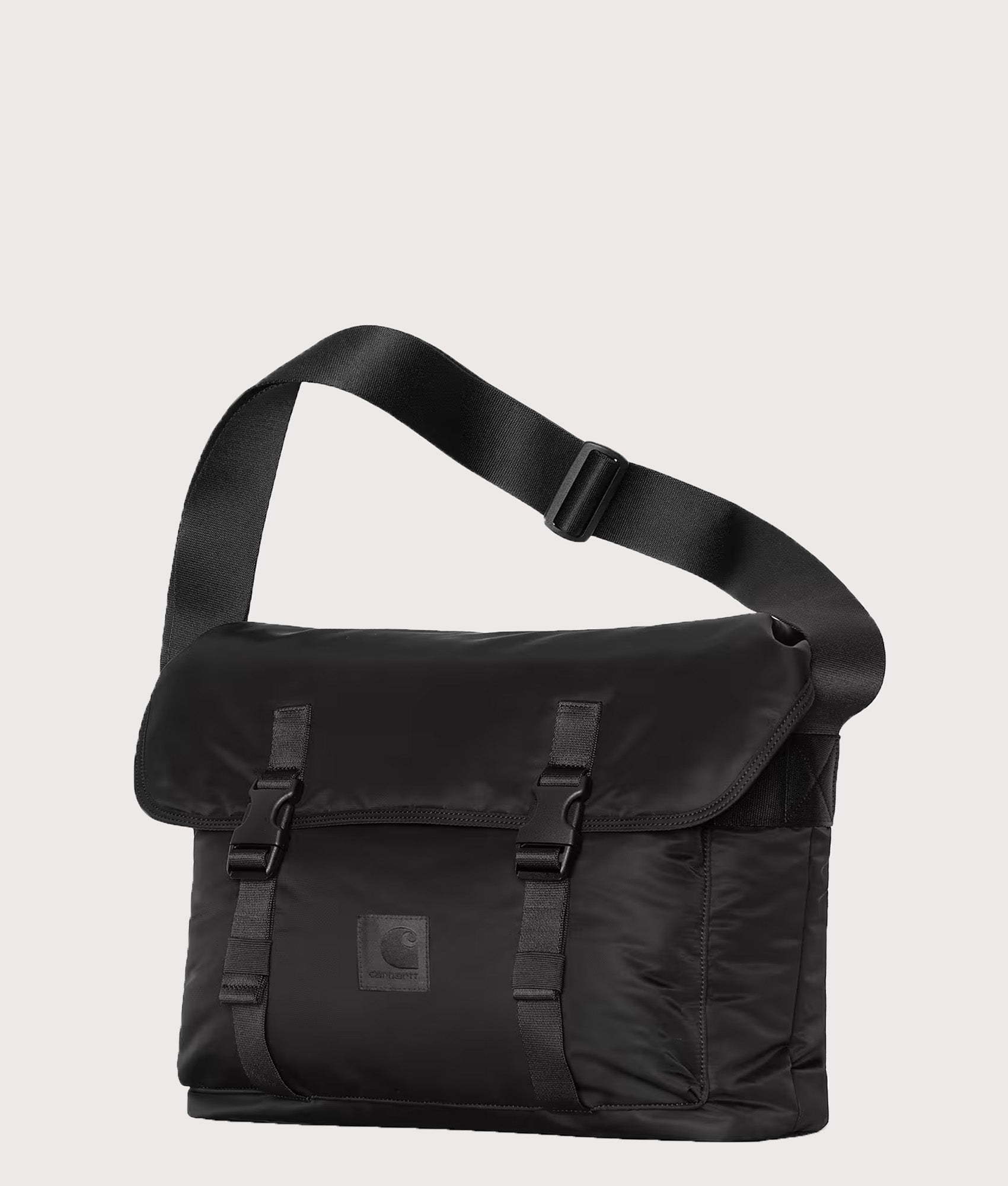 Carhartt WIP Otis Messenger Bag in  Black at EQVVS Menswear. Angled front shot.