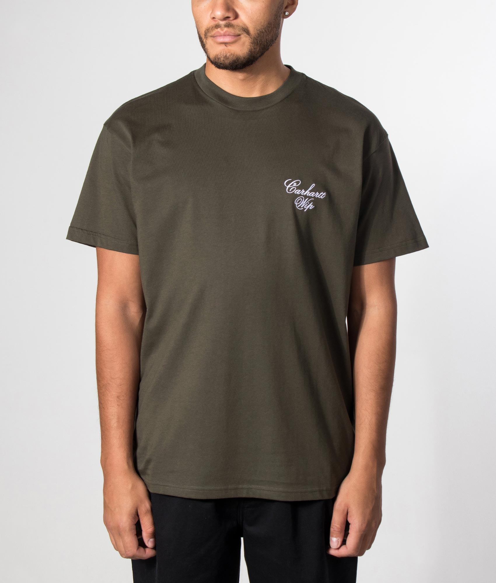 Carhartt WIP Loose Fit Gracious T-Shirt  in Cypress at EQVVS Menswear. Model front shot.