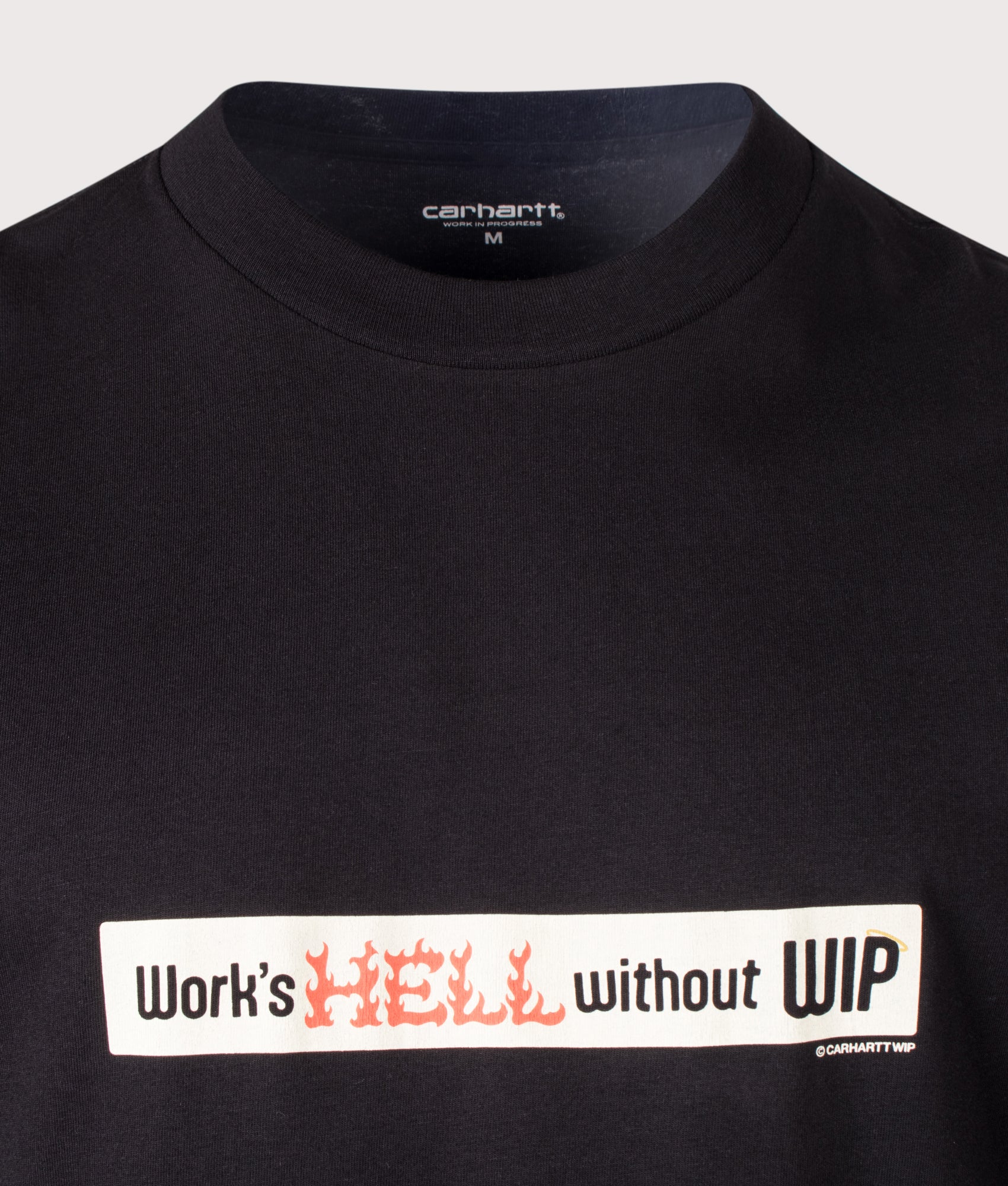 Carhartt WIP Loose Fit Bumper Stickers T-Shirt in Black at EQVVS Menswear. Detail shot.