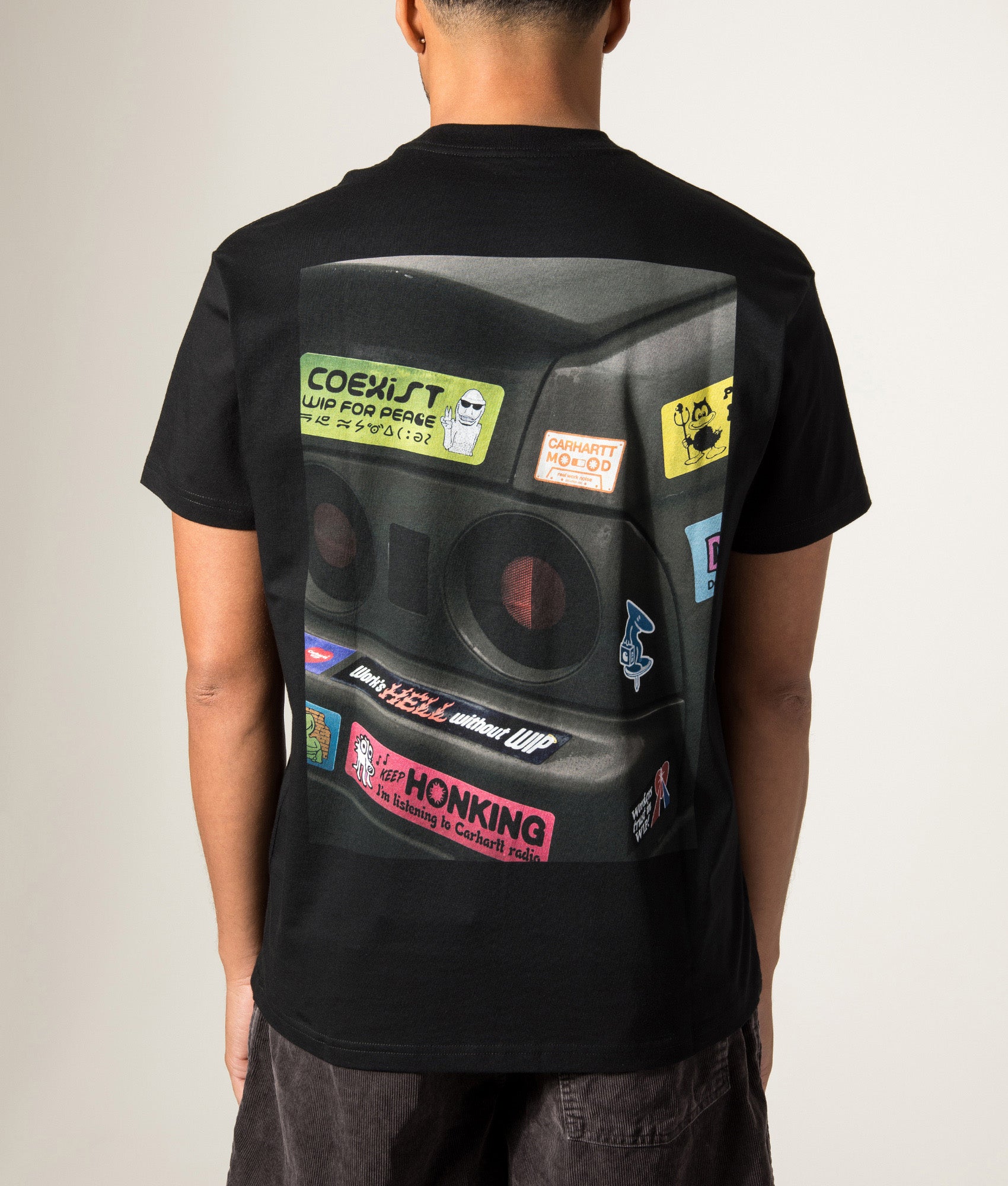 Carhartt WIP Loose Fit Bumper Car T-Shirt in Black at EQVVS Menswear. Model back shot.