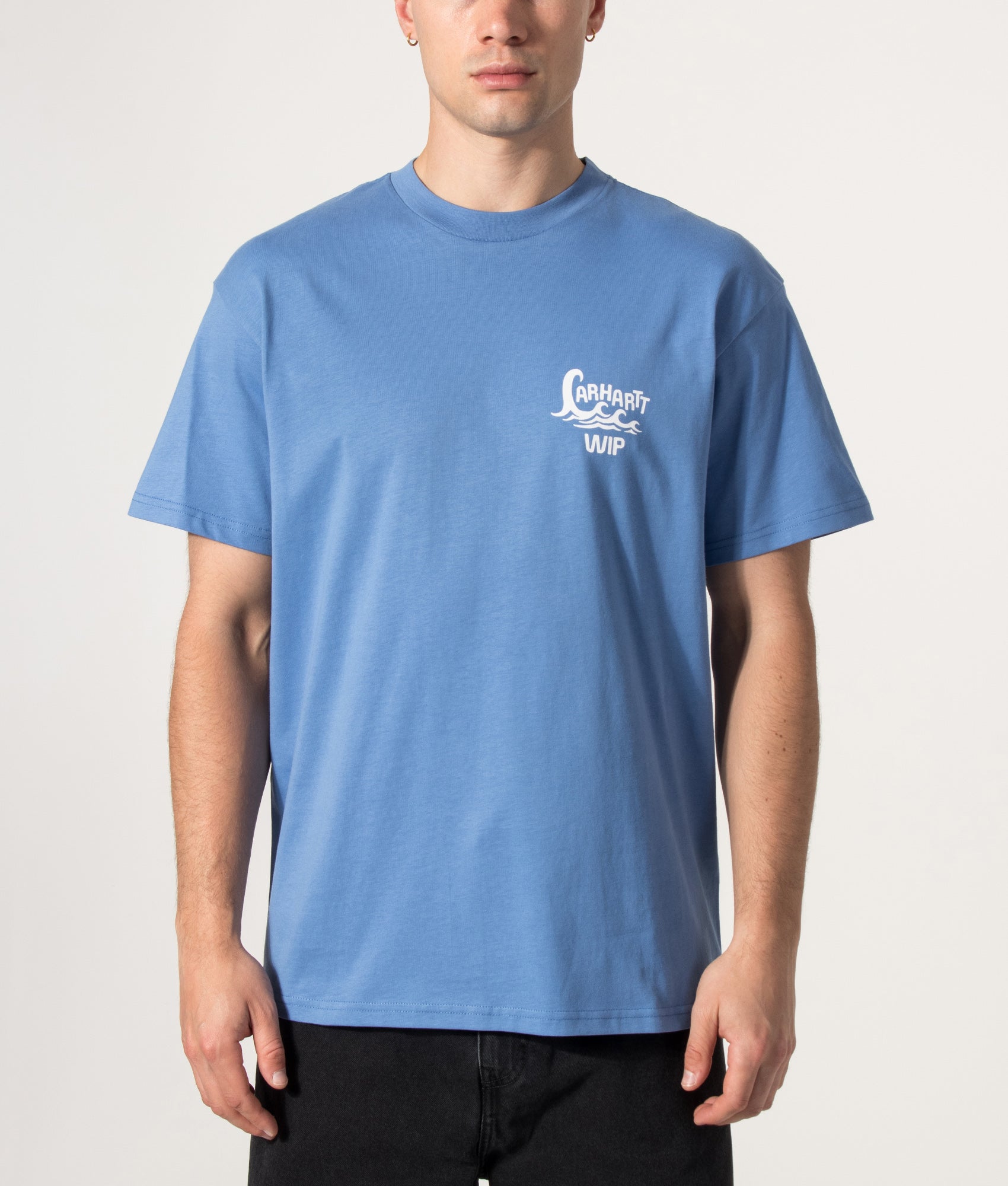 Carhartt WIP Loose Fit Waves T-Shirt in Curacao at EQVVS Menswear. Model front shot.