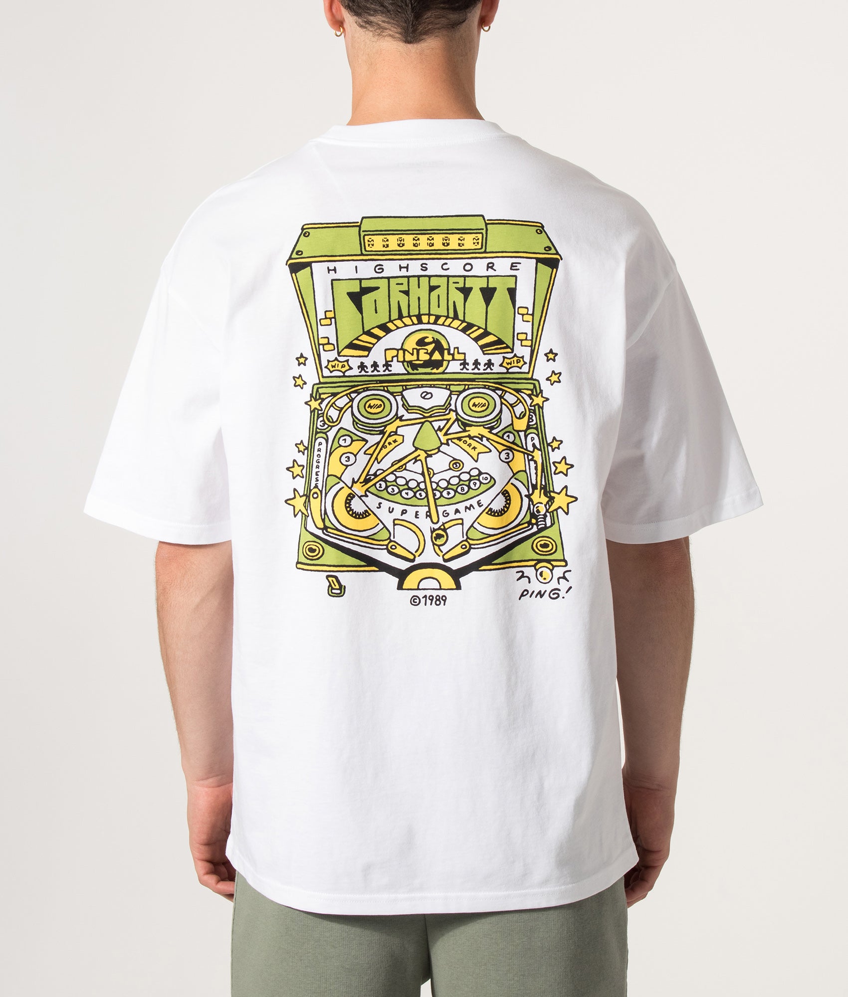 Carhartt WIP Oversized Fit Pinball T-Shirt in White at EQVVS Menswear. Model back shot.
