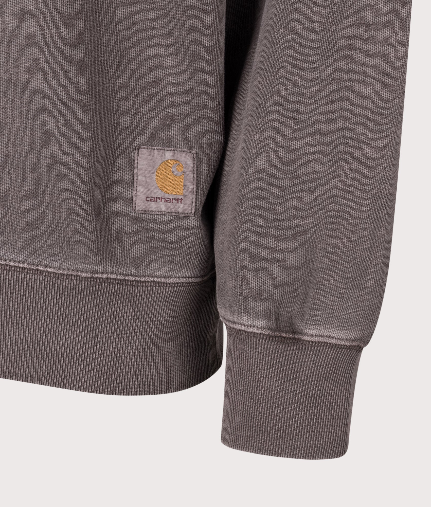 Carhartt WIP Balloon Fit Harper Quarter Zip Sweatshirt in Garment Dyed Tobacco at EQVVS Menswear. Detail shot.