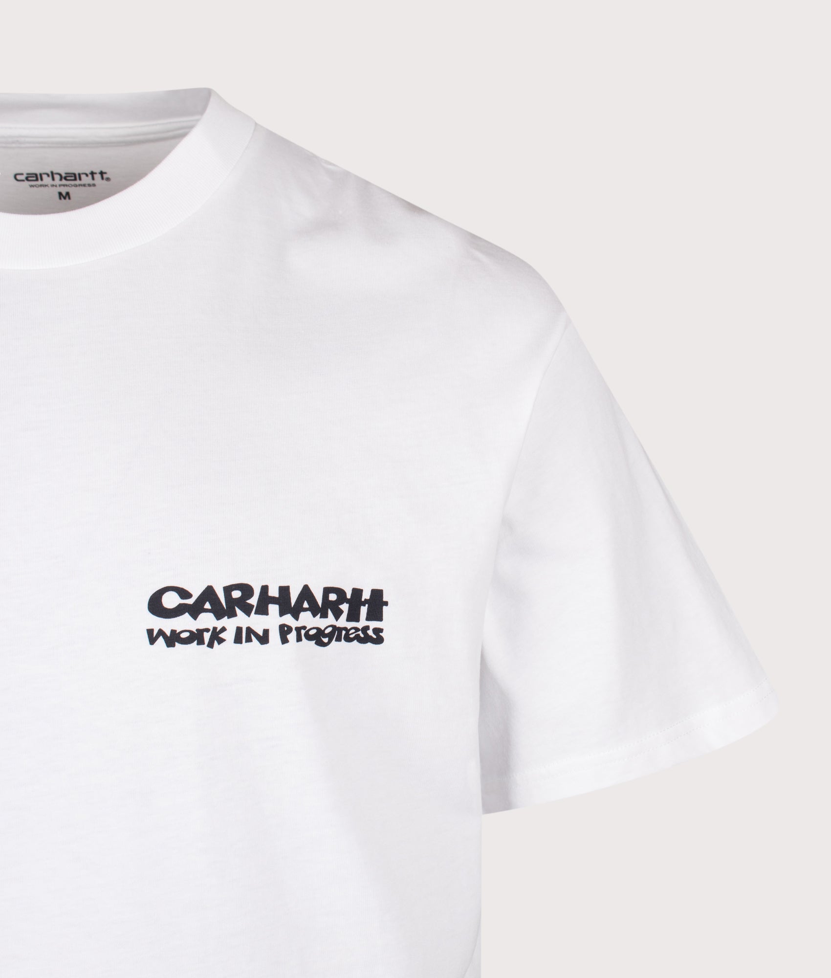 Carhartt WIP Loose Fit Cubist T-Shirt in White at EQVVS Menswear. Detail shot.