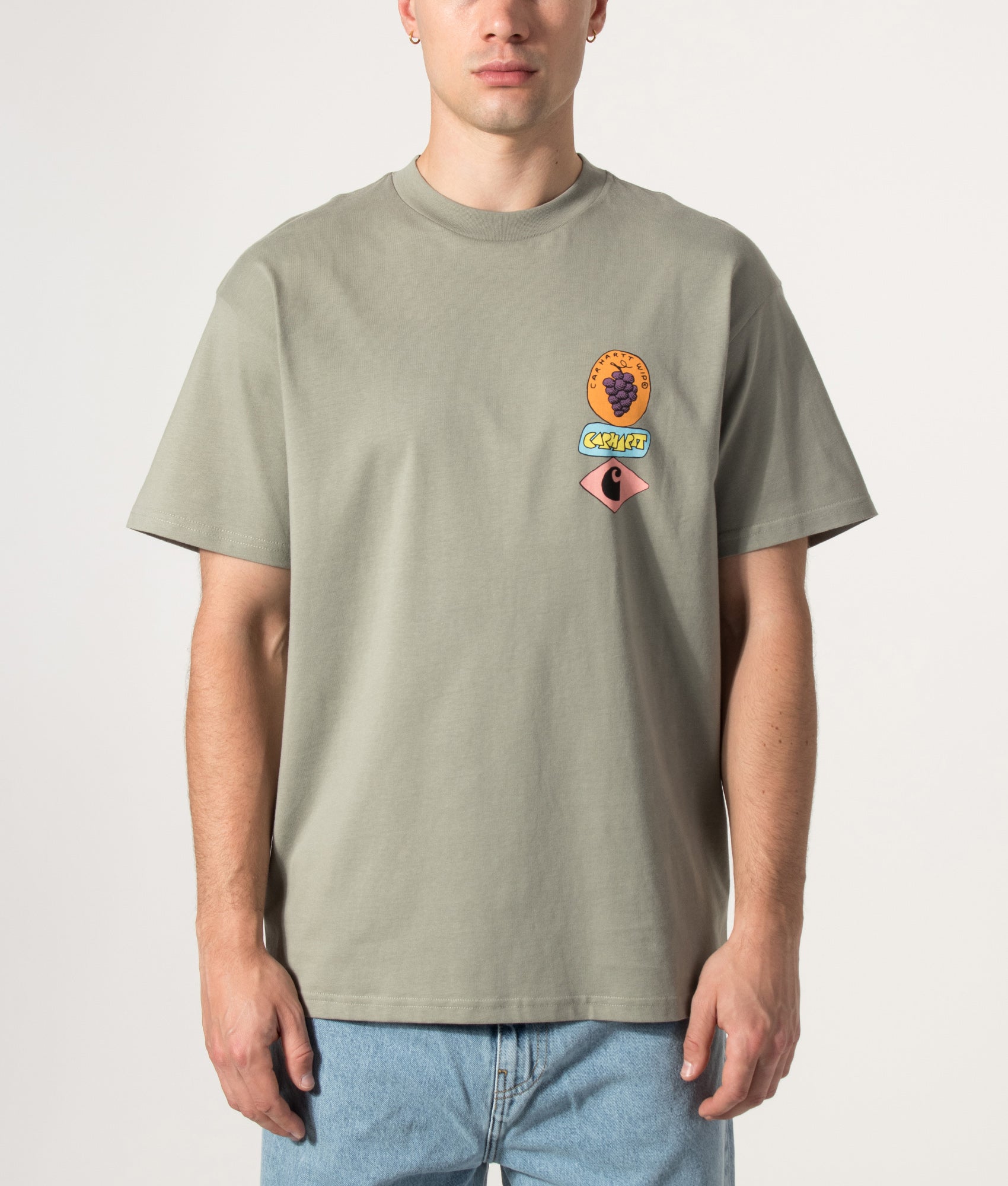 Carhartt WIP Loose Fit Stacked Grapes T-Shirt in Shady Green at EQVVS Menswear. Model front shot.