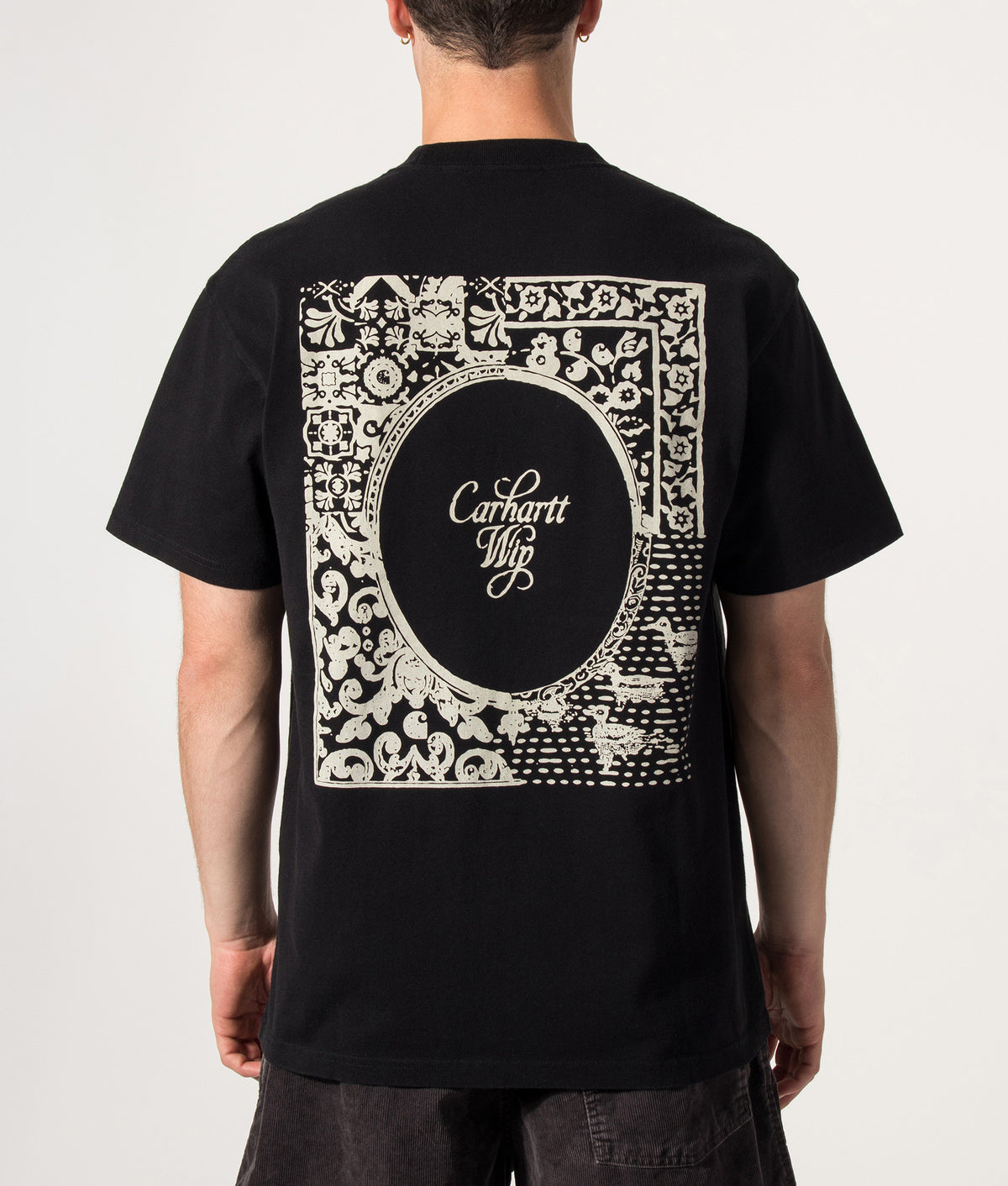 Carhartt WIP Loose Fit Vestige T-Shirt in Black at EQVVS Menswear. Model back shot.
