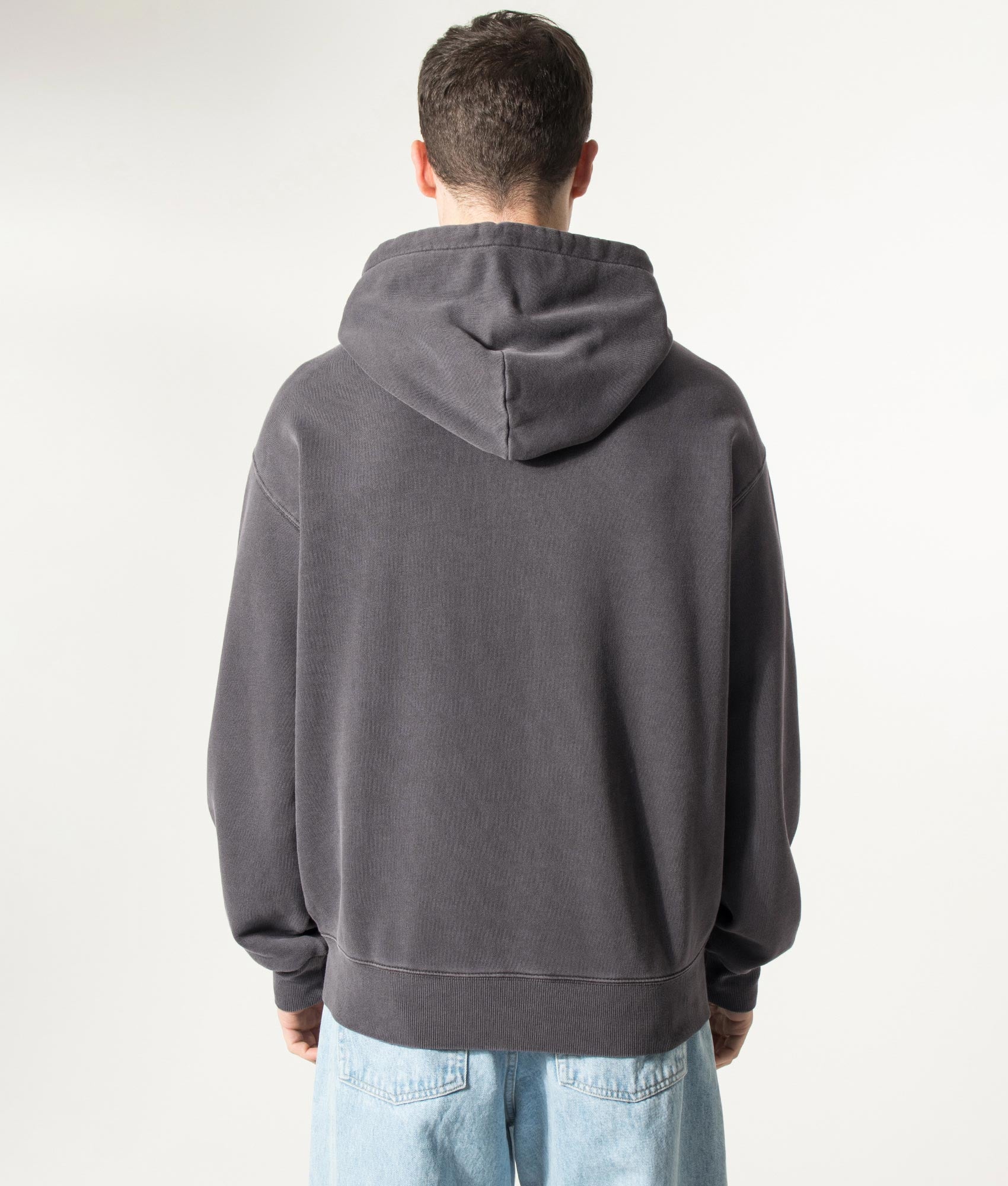 Carhartt WIP Oversized Nelson Sweatshirt in Black at EQVVS Menswear. Model back shot.