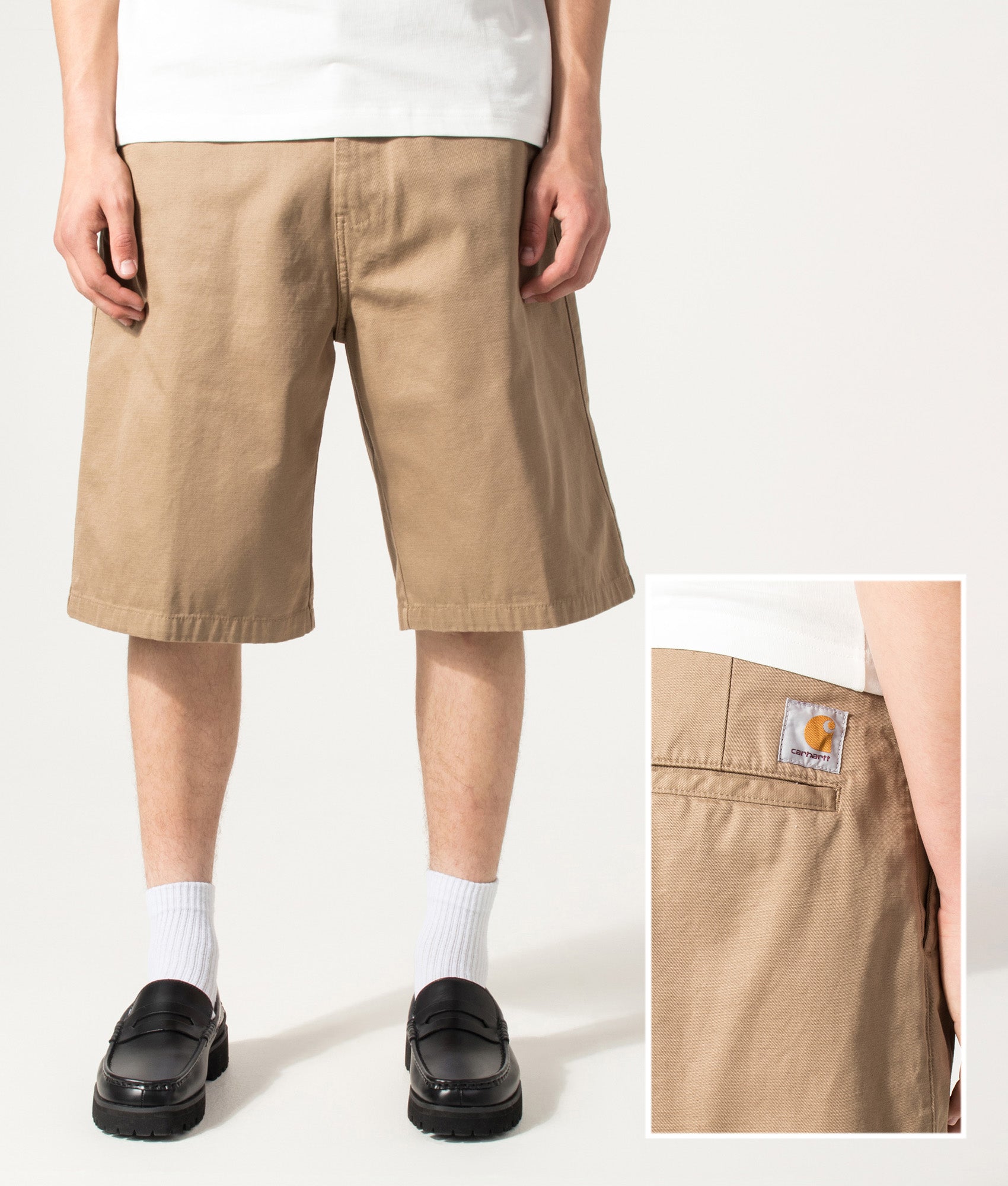 Carhartt WIP Loose Fit Brader Shorts in Rinsed Leather at EQVVS Menswear. Model front and Back detail shot.