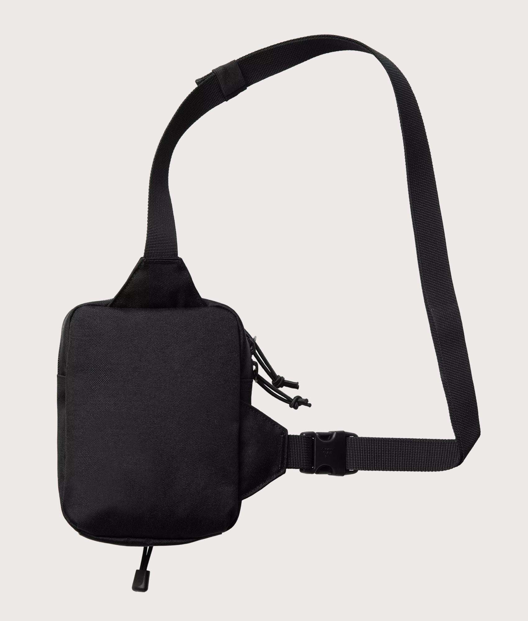Carhartt WIP Kickflip Shoulder Bag in Black at EQVVS Menswear. Back shot.