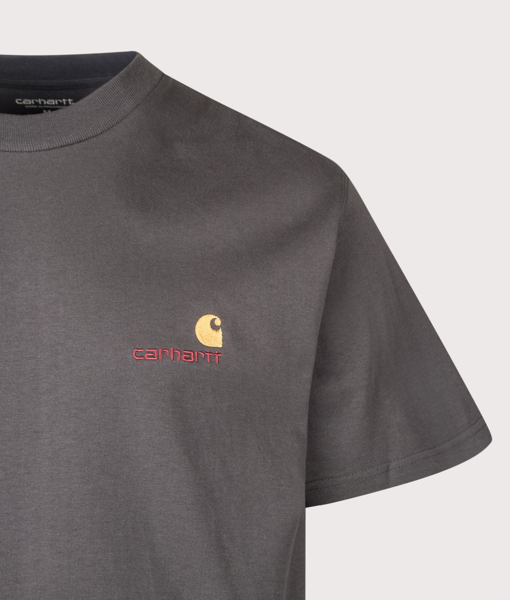 Carhartt WIP Loose Fit American Script T-Shirt in Graphite at EQVVS Menswear.  Detail shot.
