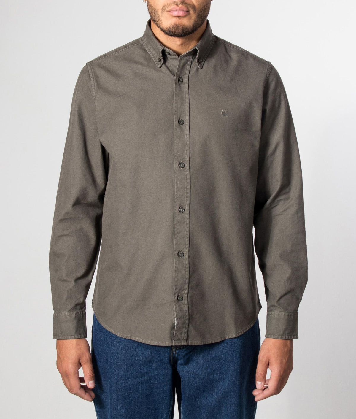 Carhartt WIP Regular Fit Bolton Shirt in Shungite at EQVVS Menswear. Model front shot.
