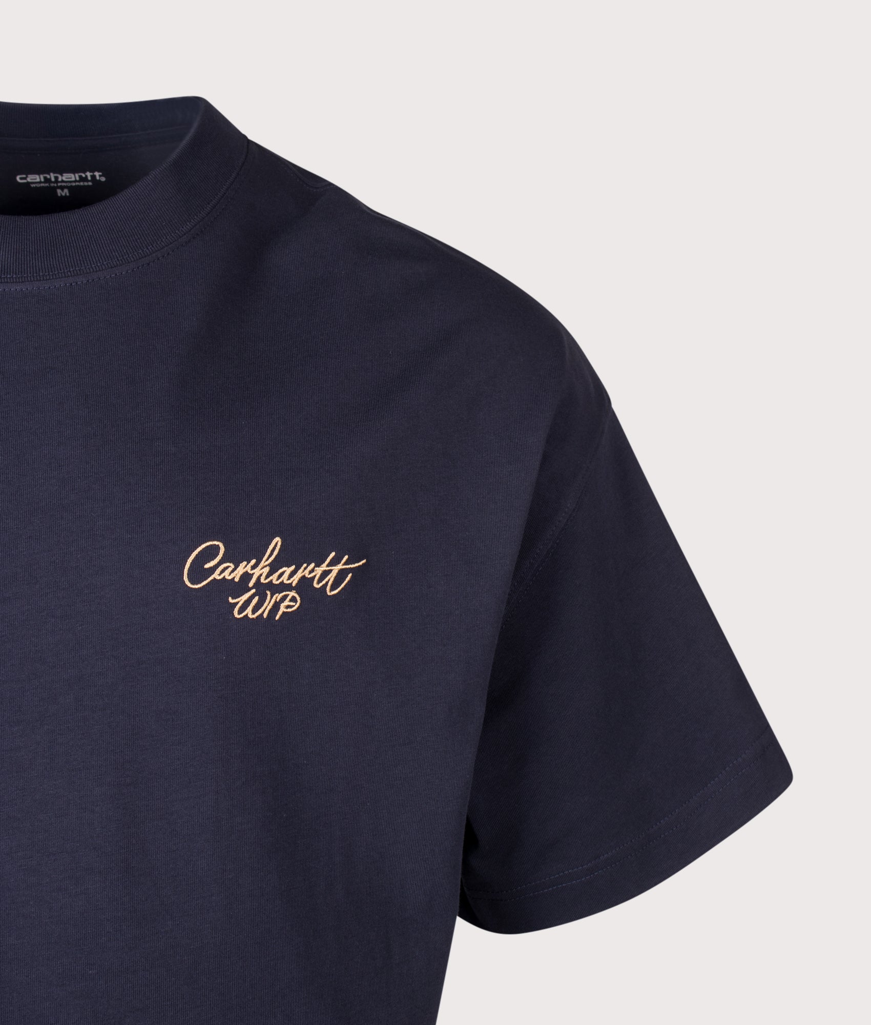 Carhartt WIP Boxy Loose Fit Signature Script T-Shirt in Dark Navy and WIP Dusty H at EQVVS Menswear. Detail shot.