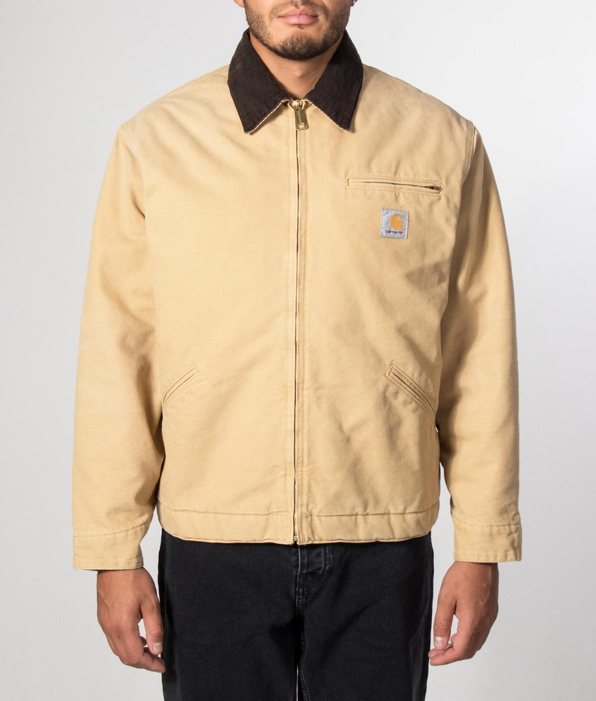 Carhartt WIP Loose Fit OG Detroit Jacket in WIP Dusty H and Tobacco at EQVVS Menswear. Model front shot.