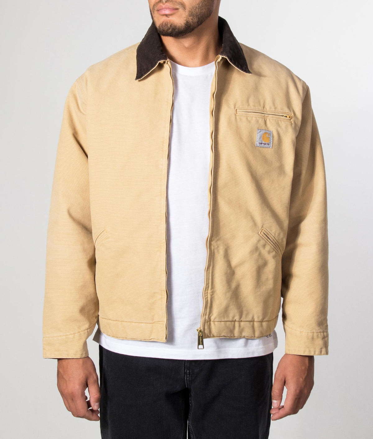 Carhartt WIP Loose Fit OG Detroit Jacket in WIP Dusty H and Tobacco at EQVVS Menswear. Model front shot.