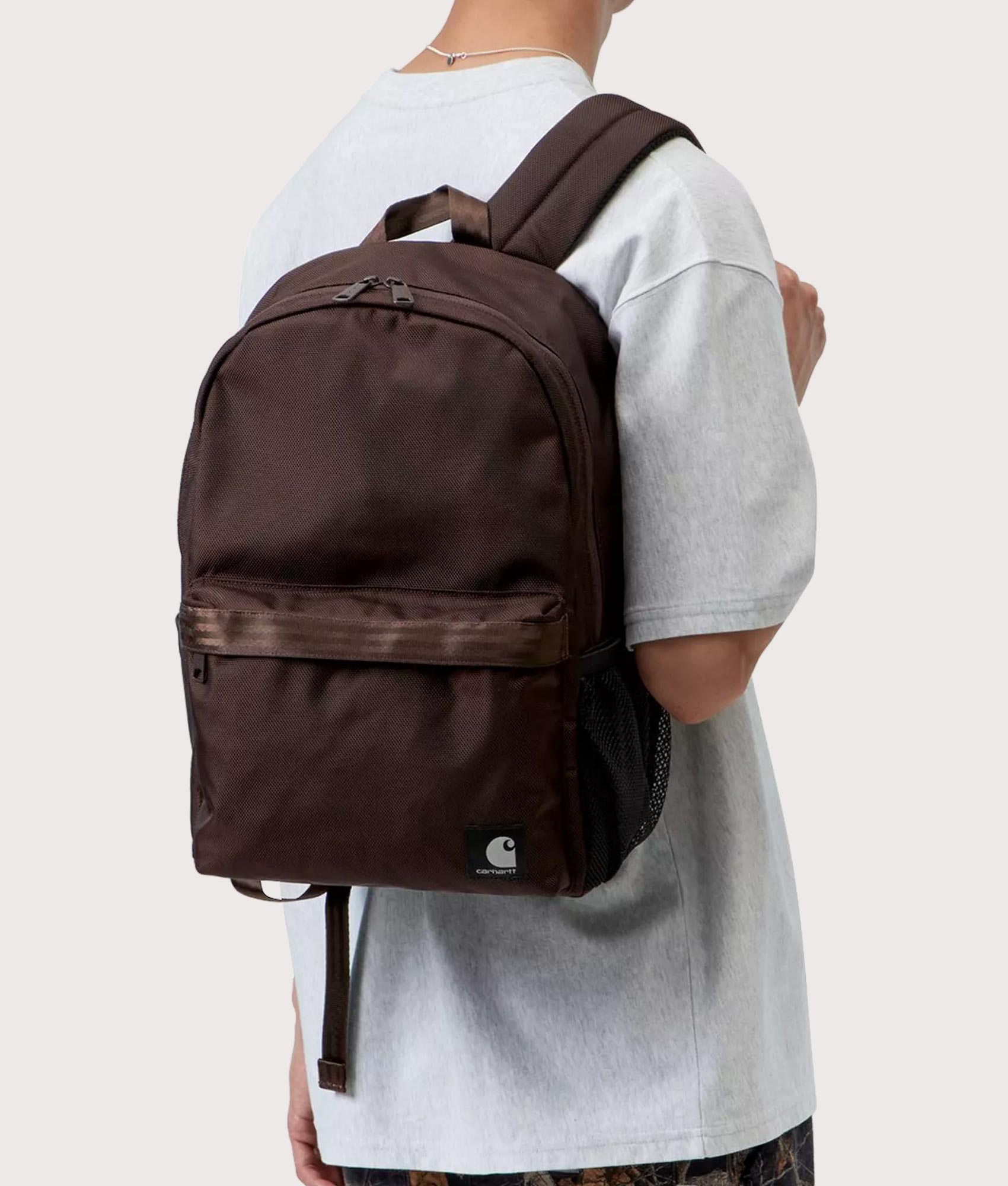 Carhartt WIP Richmond Backpack in Palisander at EQVVS Menswear. Model shot.