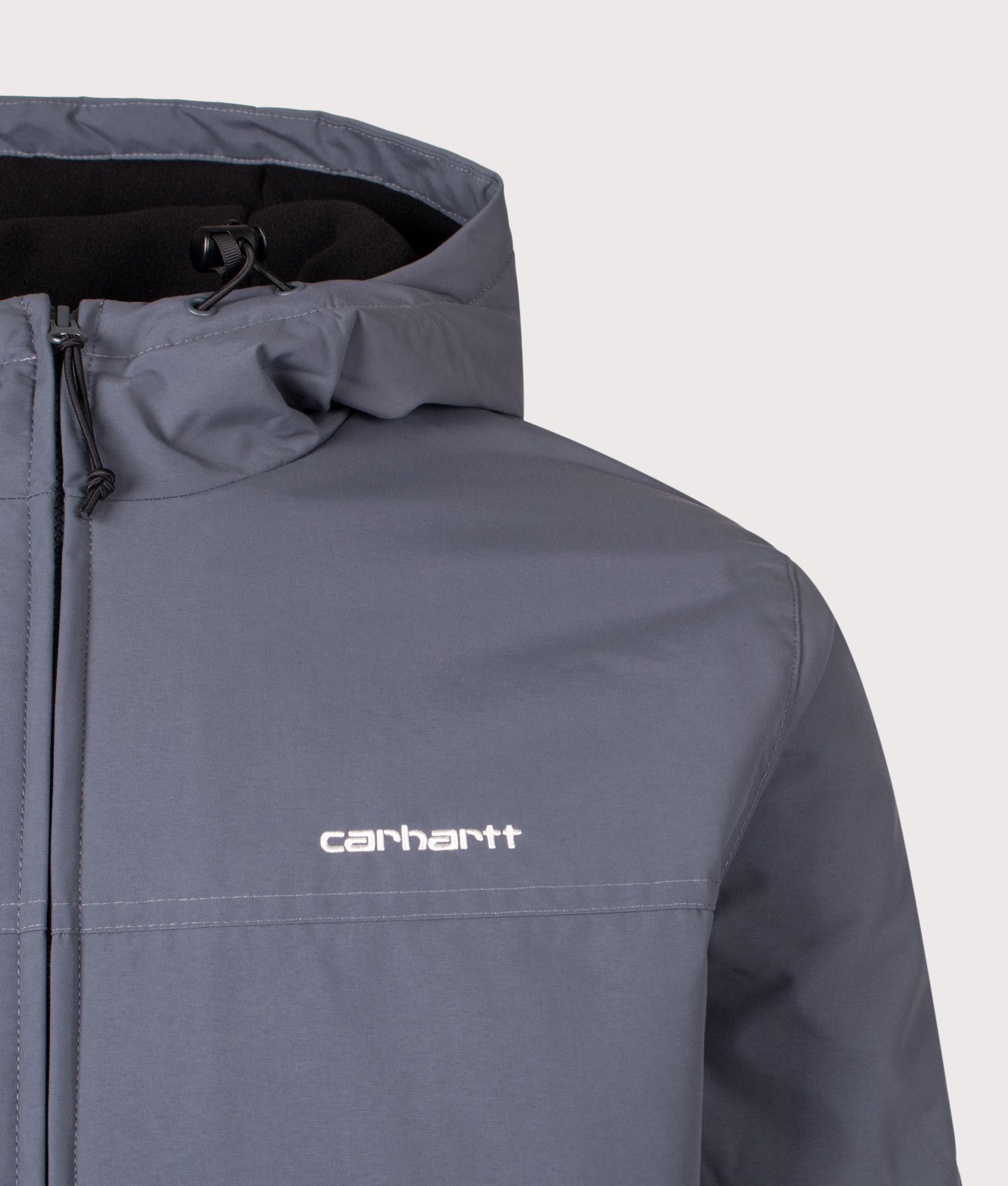 Carhartt WIP Regular Fit Hooded Sail Jacket in Styx and White at EQVVS Menswear. Detail shot.