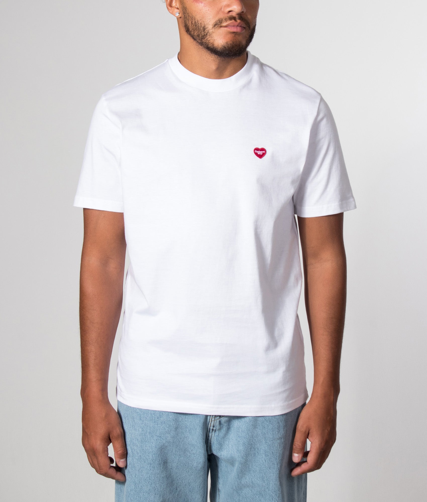 Carhartt WIP Regular Fit Small Heart T-Shirt in White at EQVVS Menswear. Model front shot.