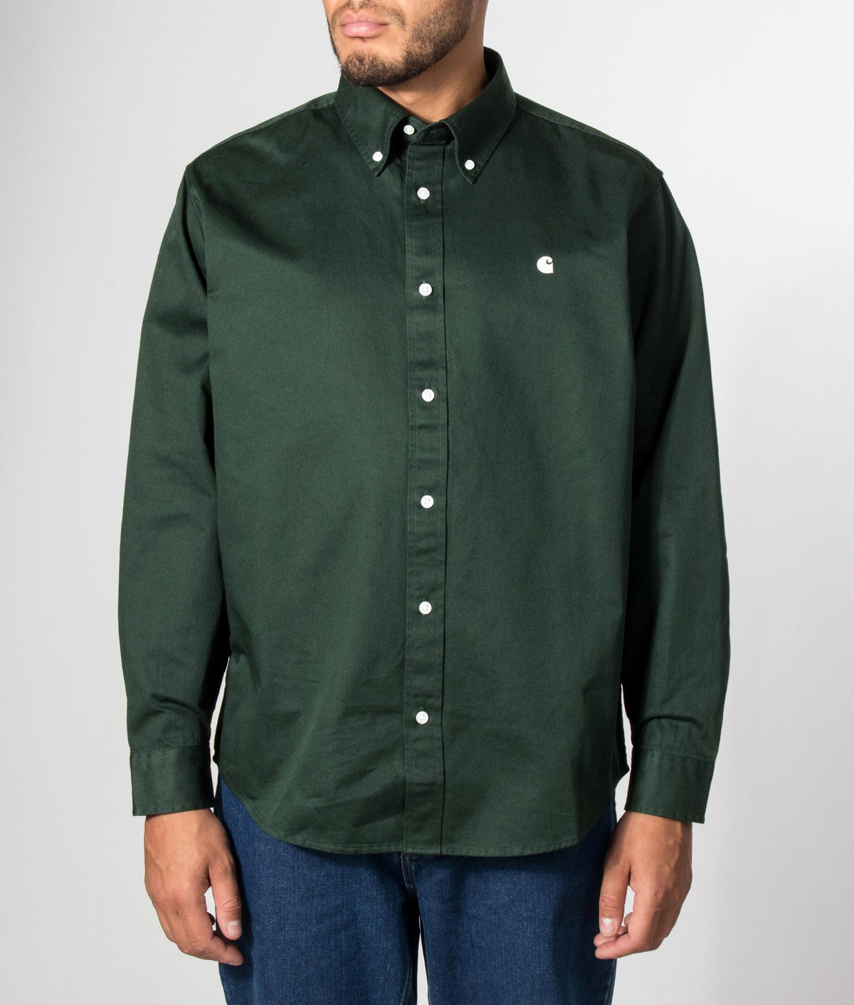 Carhartt WIP Loose Fit OG Madison Shirt in Dark Scarab at EQVVS Menswear. Model front shot.
