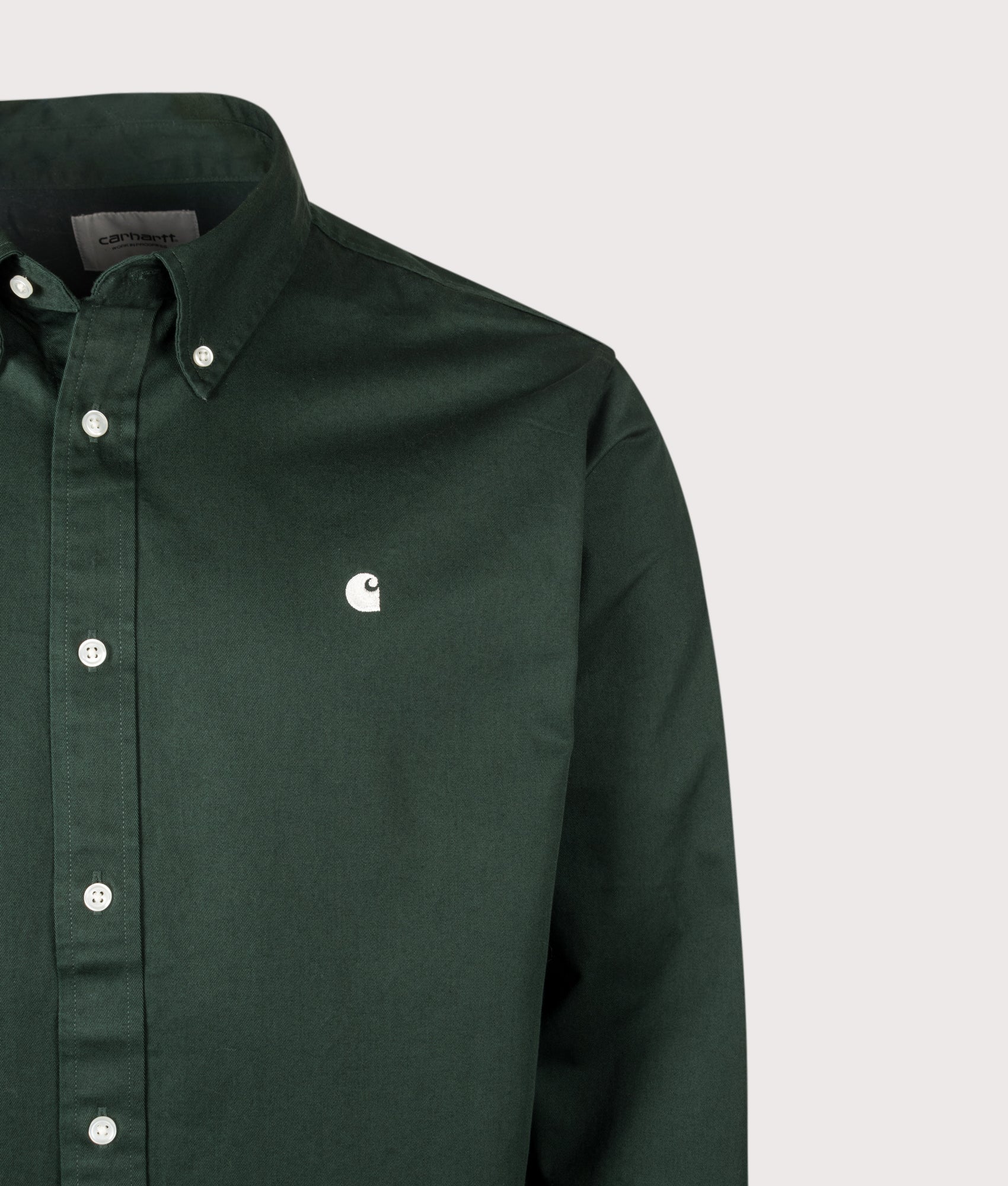 Carhartt WIP Loose Fit OG Madison Shirt in Dark Scarab at EQVVS Menswear. Detail shot.