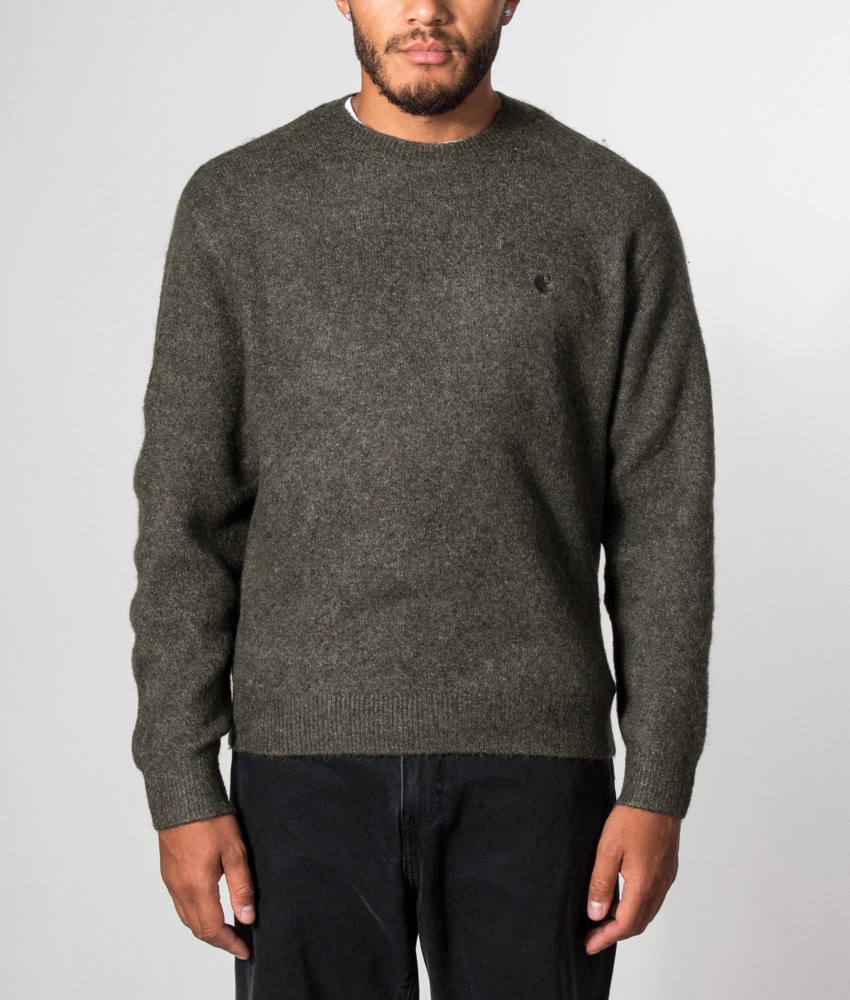 Carhartt WIP Regular Fit Curtis Jumper in Tangled Shungite at EQVVS Menswear. Model front shot.