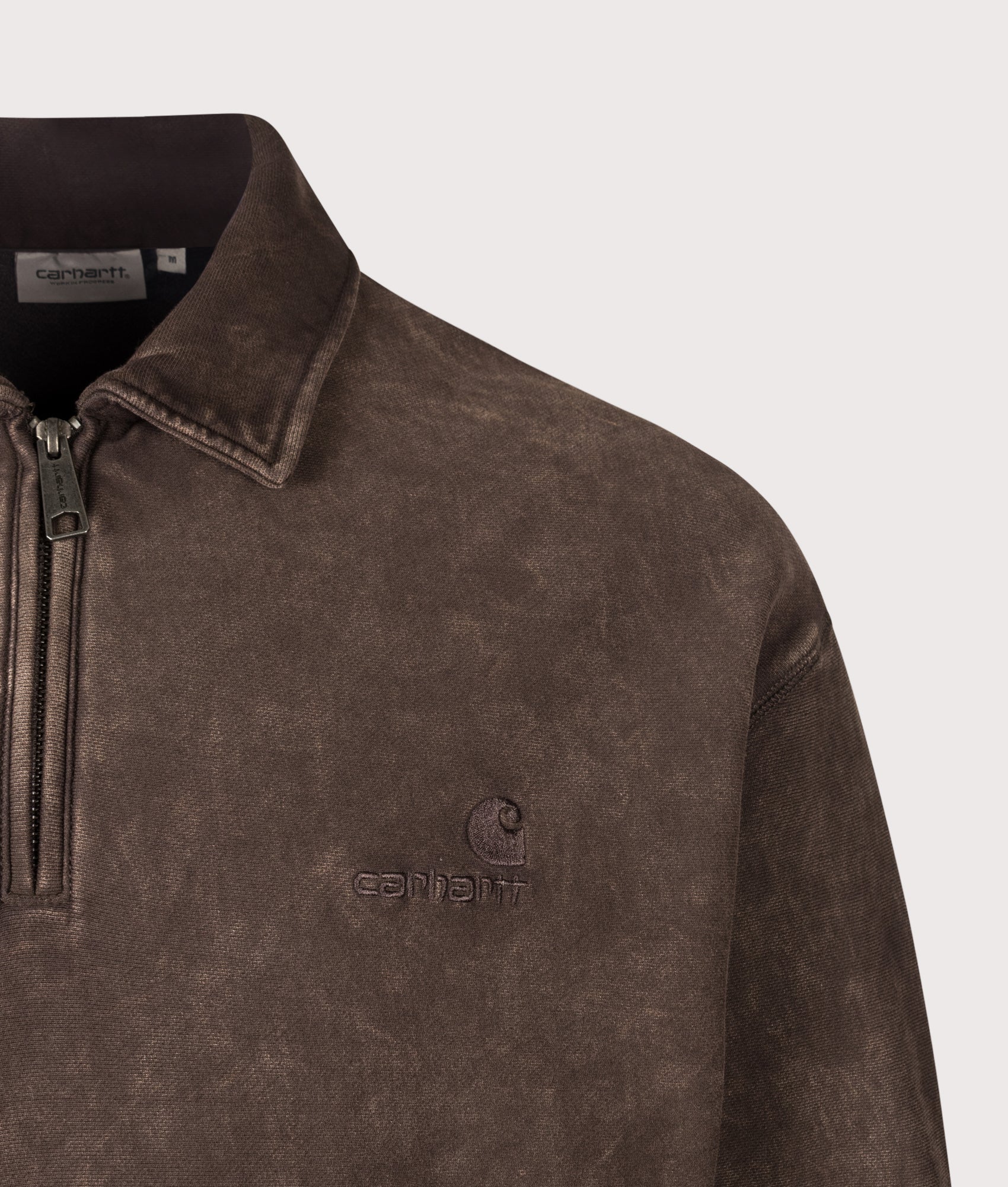 Carhartt WIP  Boxy Loose Fit Lambert Polo Neck Sweatshirt in Tobacco Moon Wash at EQVVS Menswear. Detail shot.