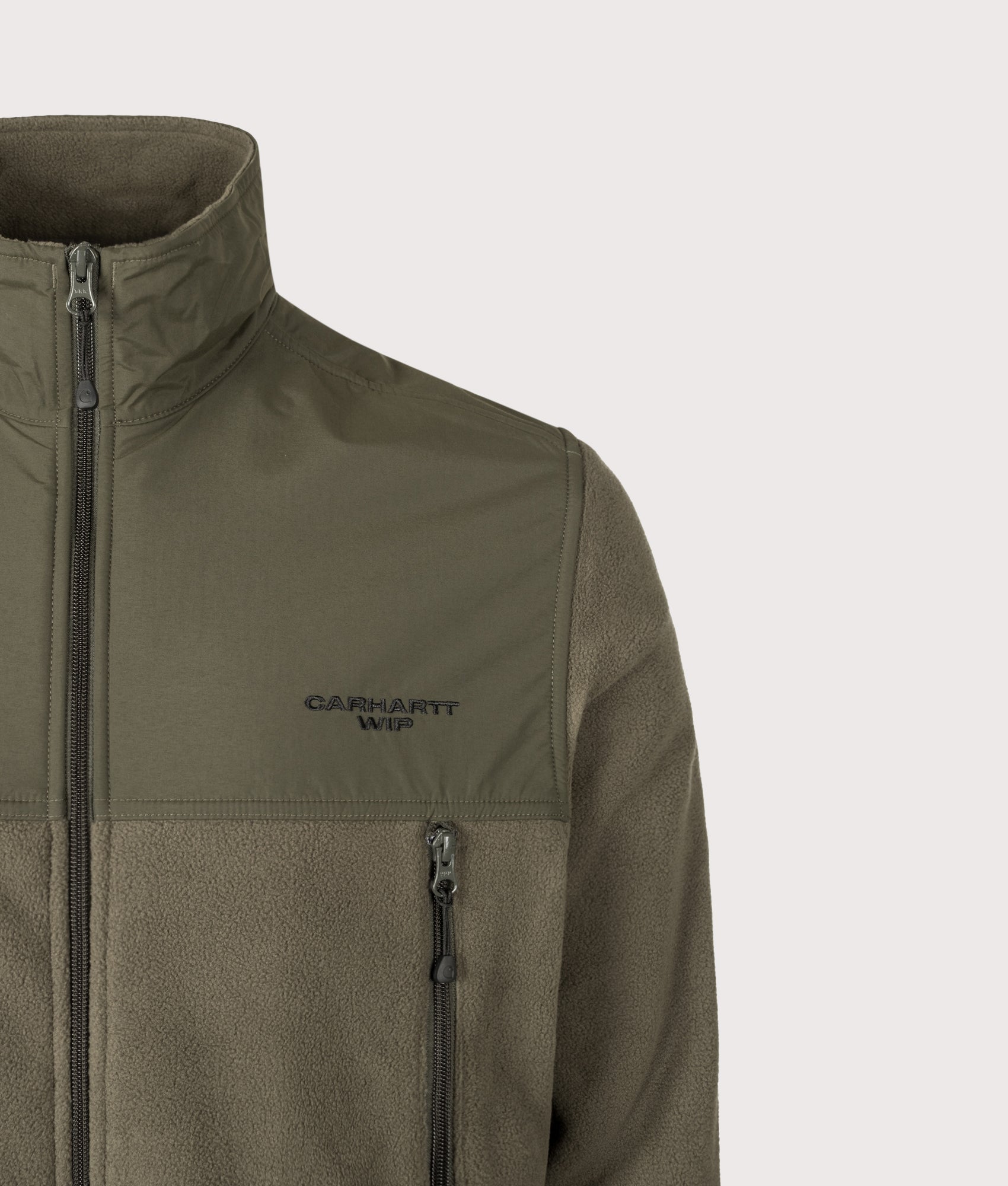 Carhartt WIP Balloon Fit Edmore Fleece Jacket in Cypress and Black at EQVVS Menswear. Detail shot.