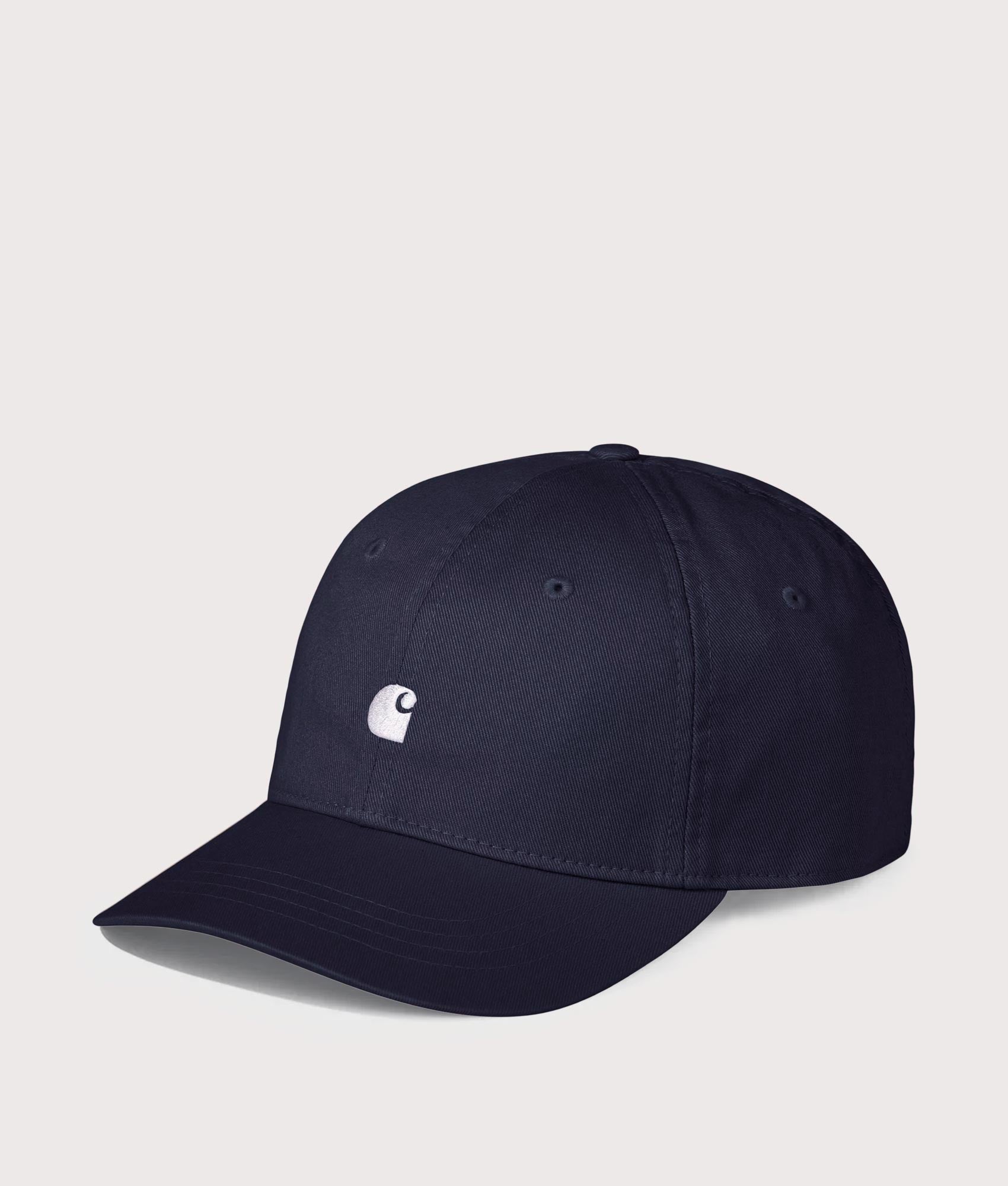 Carhartt WIP Madison Logo Cap in Dark Navy and White at EQVVS Menswear. Angled front shot.