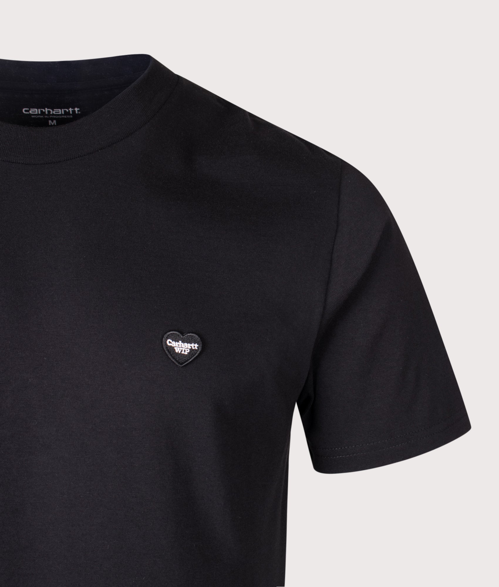 Carhartt WIP Regular Fit Small Heart T-Shirt in Black at EQVVS Menswear. Detail shot.