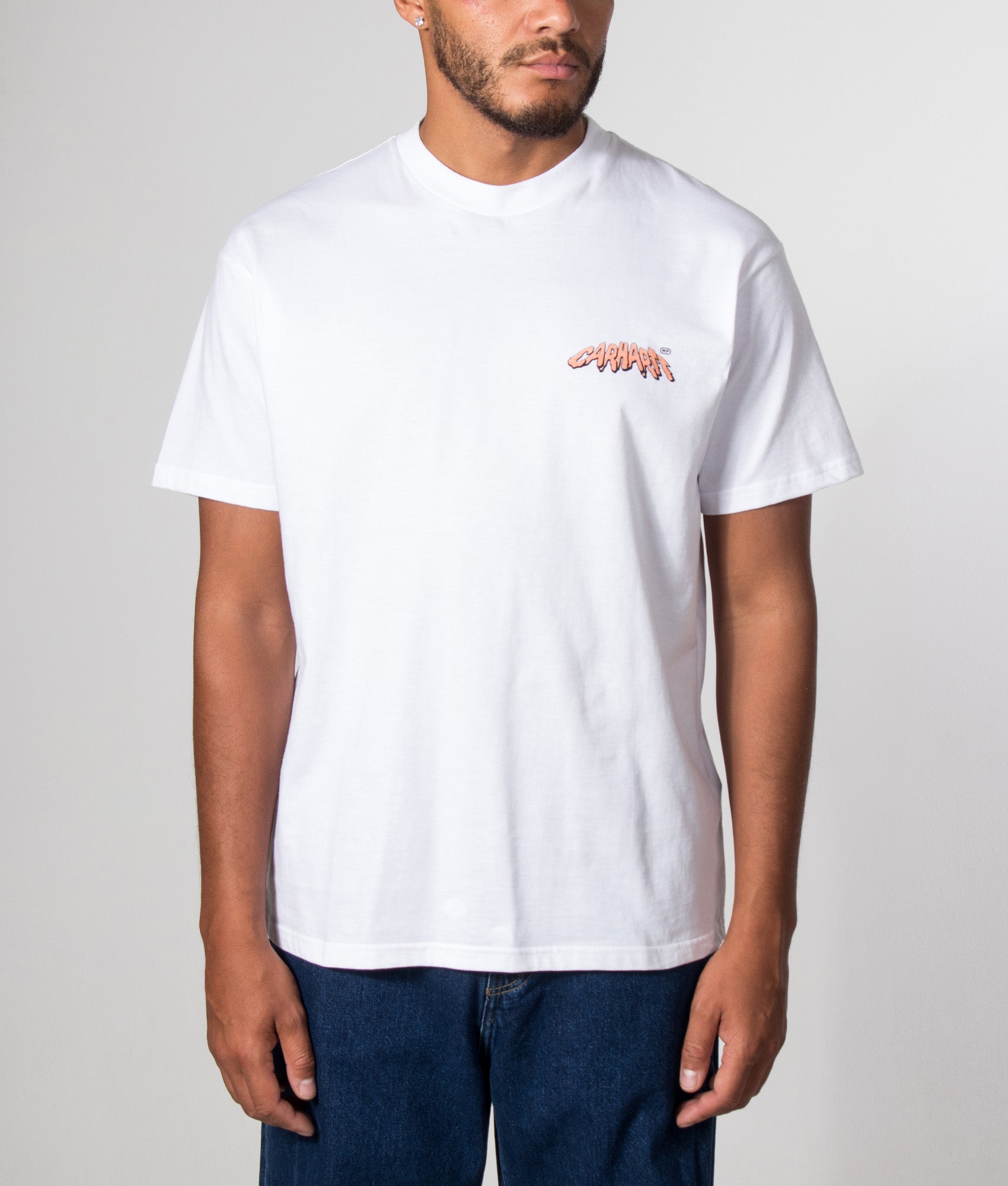 Carhartt WIP Loose Fit Wiptopia II T-Shirt in White at EQVVS Menswear. Model front shot.