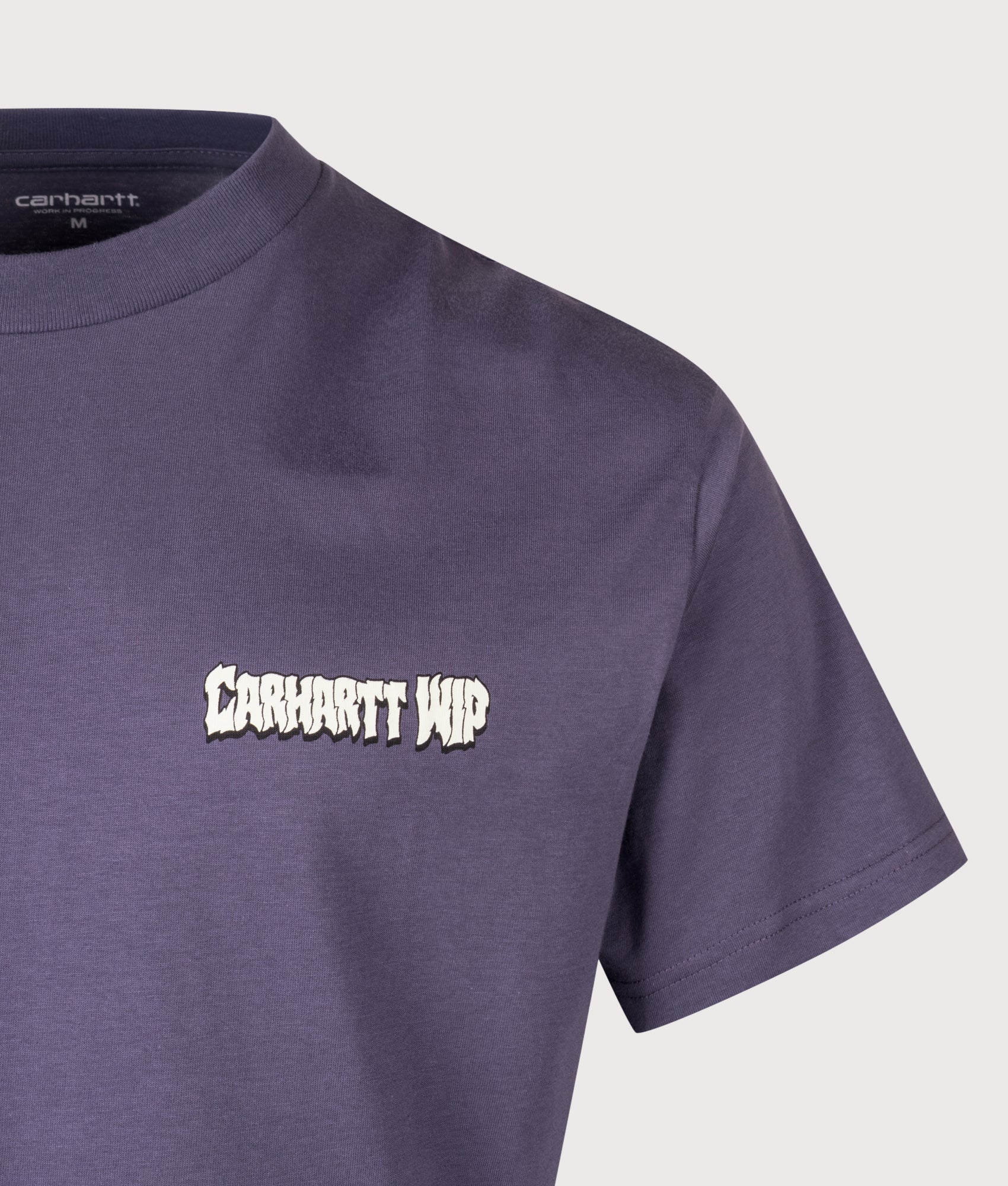 Carhartt WIP Loose Fit Wiptopia II T-Shirt in Shady Purple at EQVVS Menswear. Detail shot.