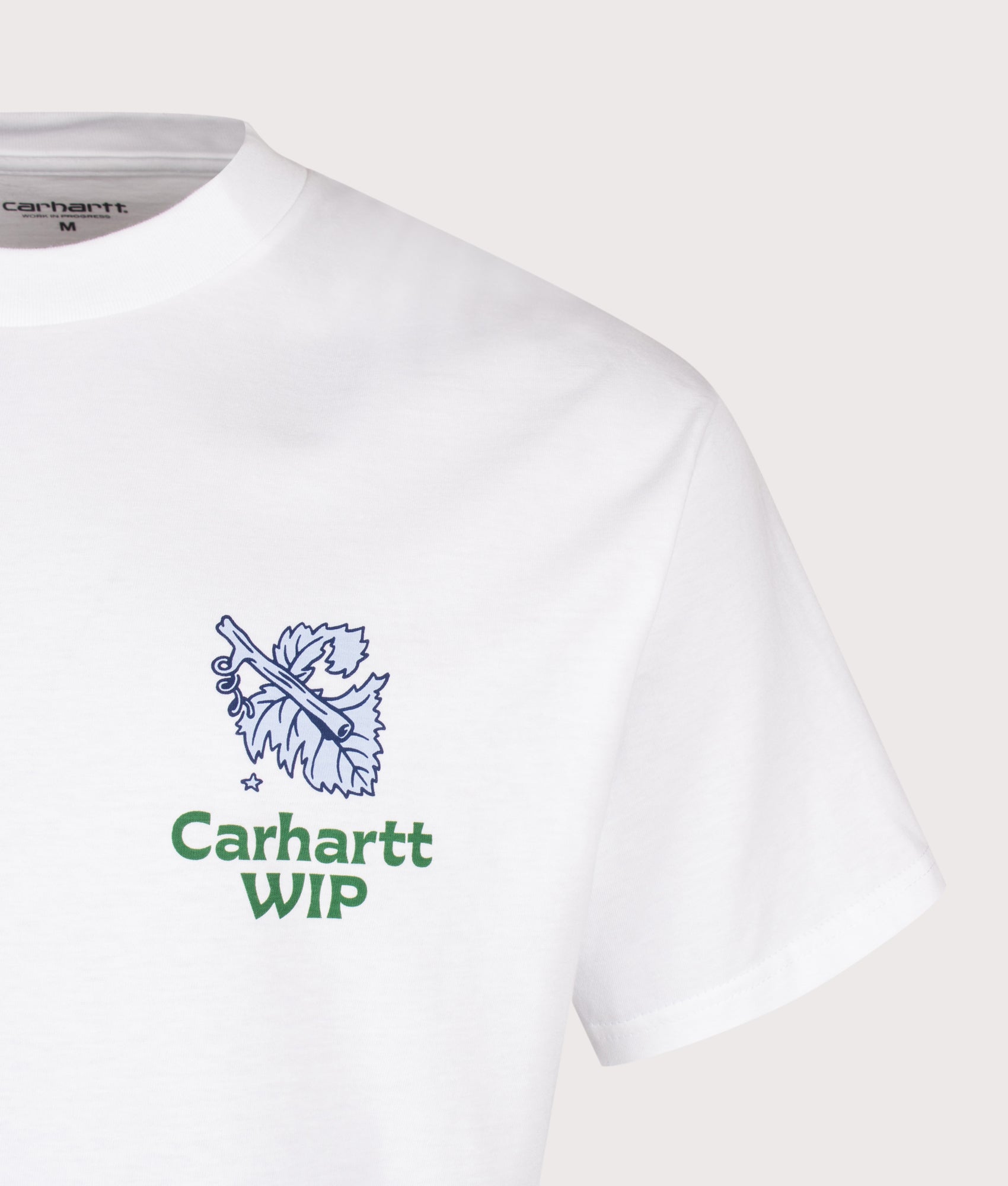 Carhartt WIP Loose Fit Grape Picker T-Shirt in White at EQVVS Menswear. Detail shot.