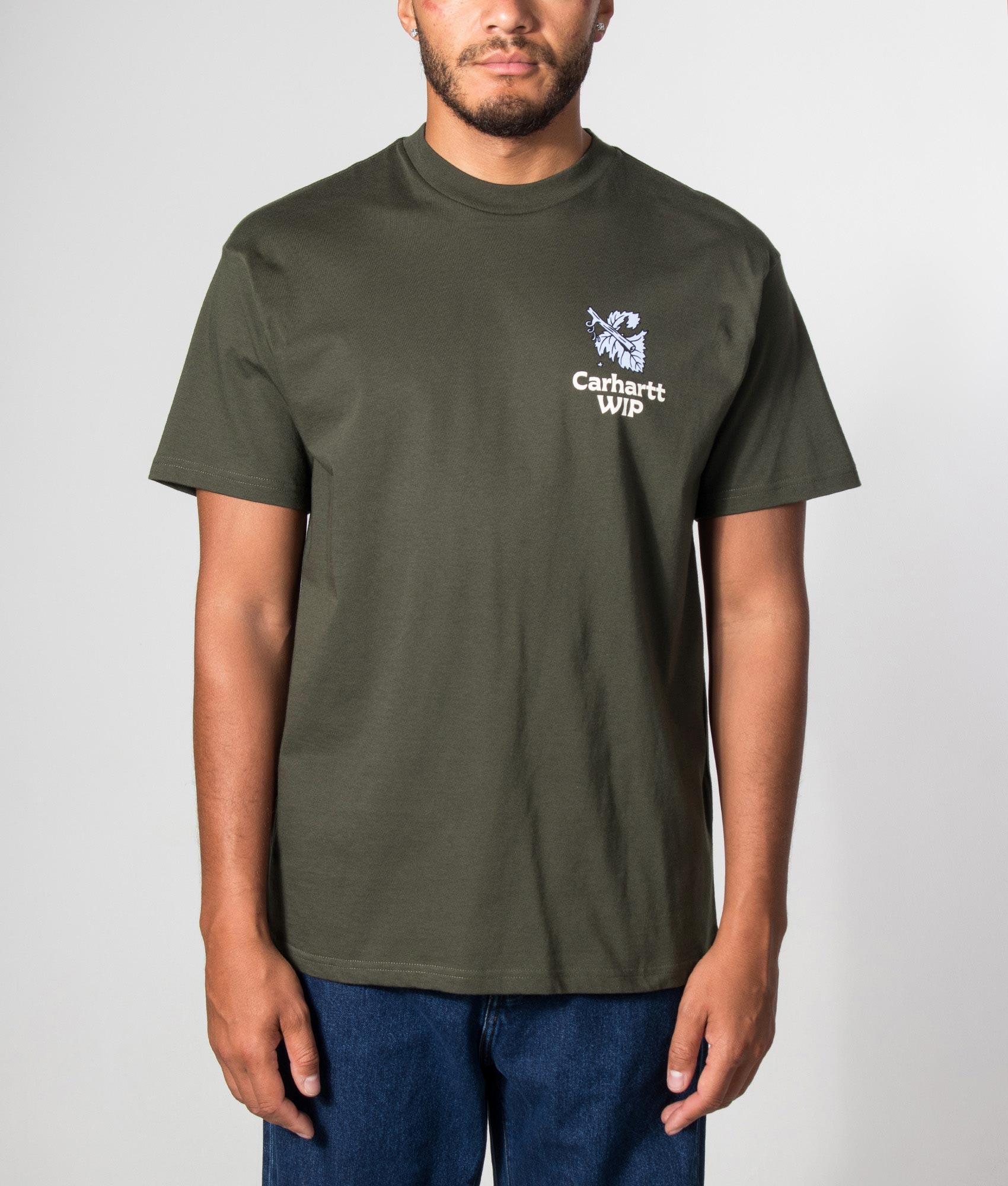 Carhartt WIP Loose Fit Grape Picker T-Shirt in Cypress at EQVVS Menswear. Model front shot.