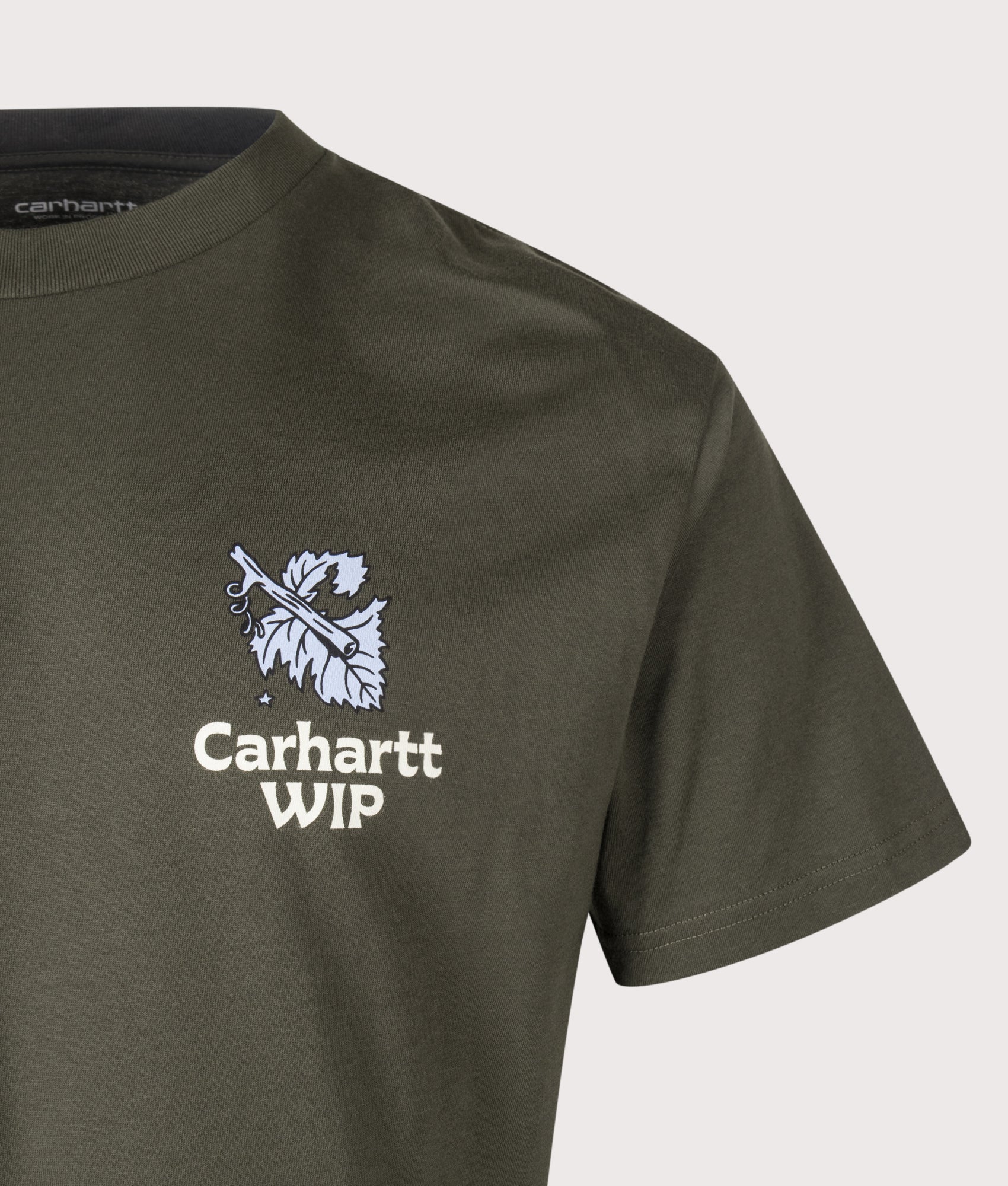 Carhartt WIP Loose Fit Grape Picker T-Shirt in Cypress at EQVVS Menswear. Detail shot.