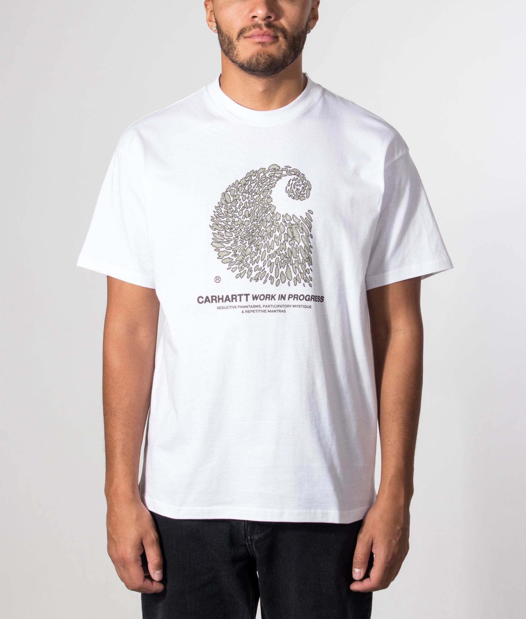Carhartt WIP Loose Fit Entrance T-Shirt in White at EQVVS Menswear. Model front shot.
