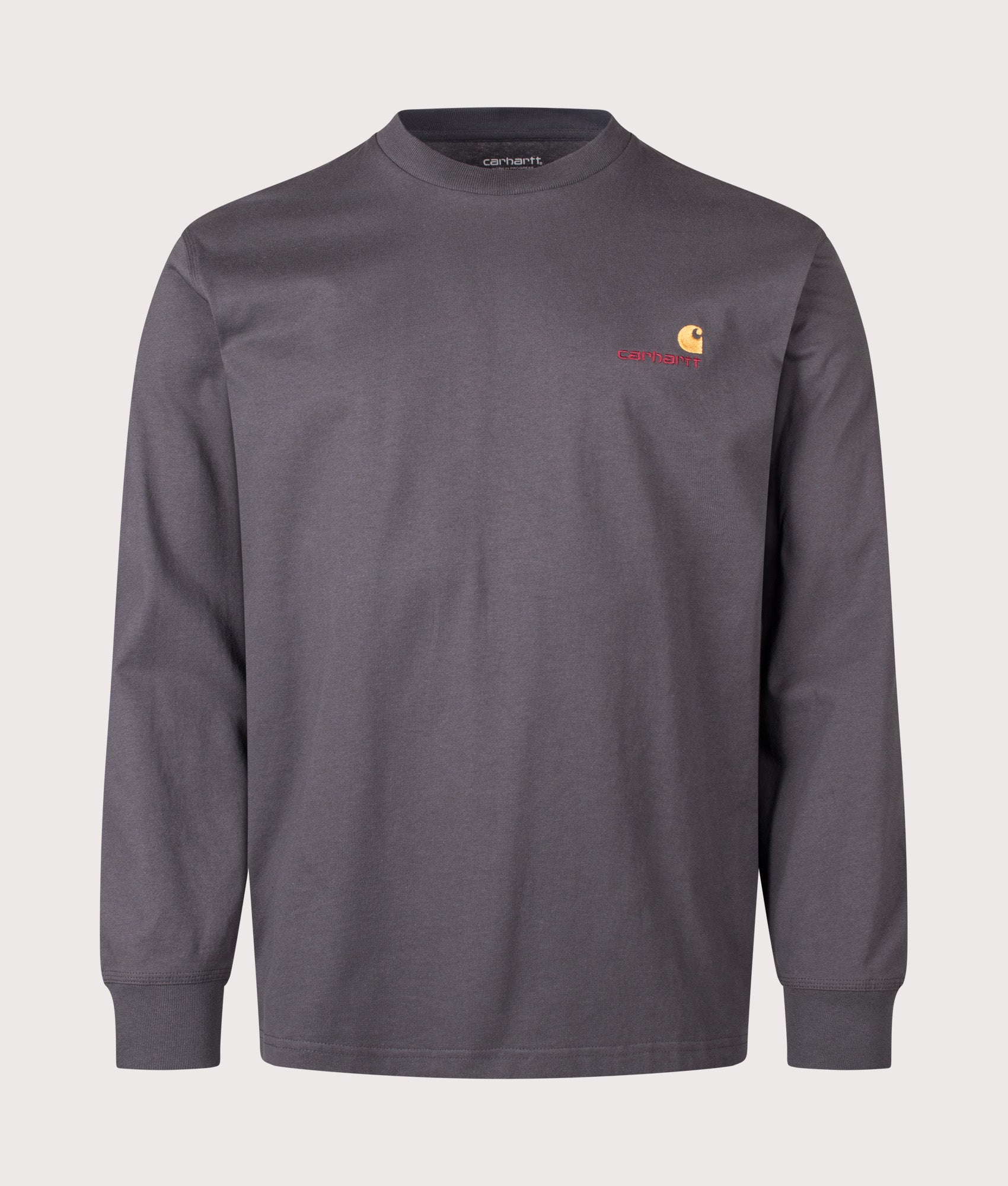 Carhartt WIP Loose Fit American Script Long Sleeve T-Shirt in Graphite at EQVVS Menswear. Front shot.