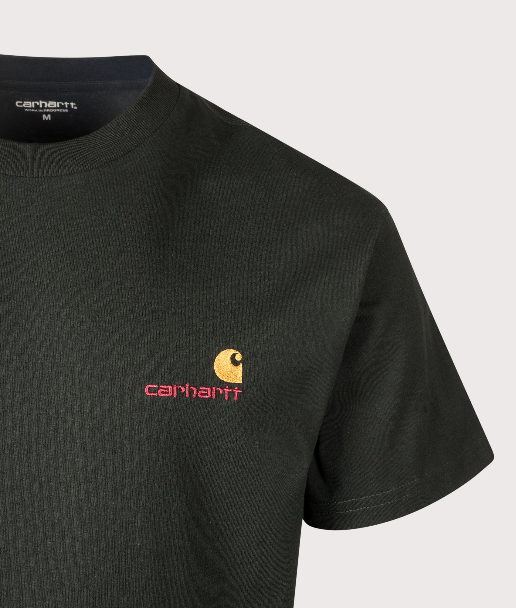 Carhartt WIP Loose Fit American Script T-Shirt in Raven at EQVVS Menswear. Detail shot.