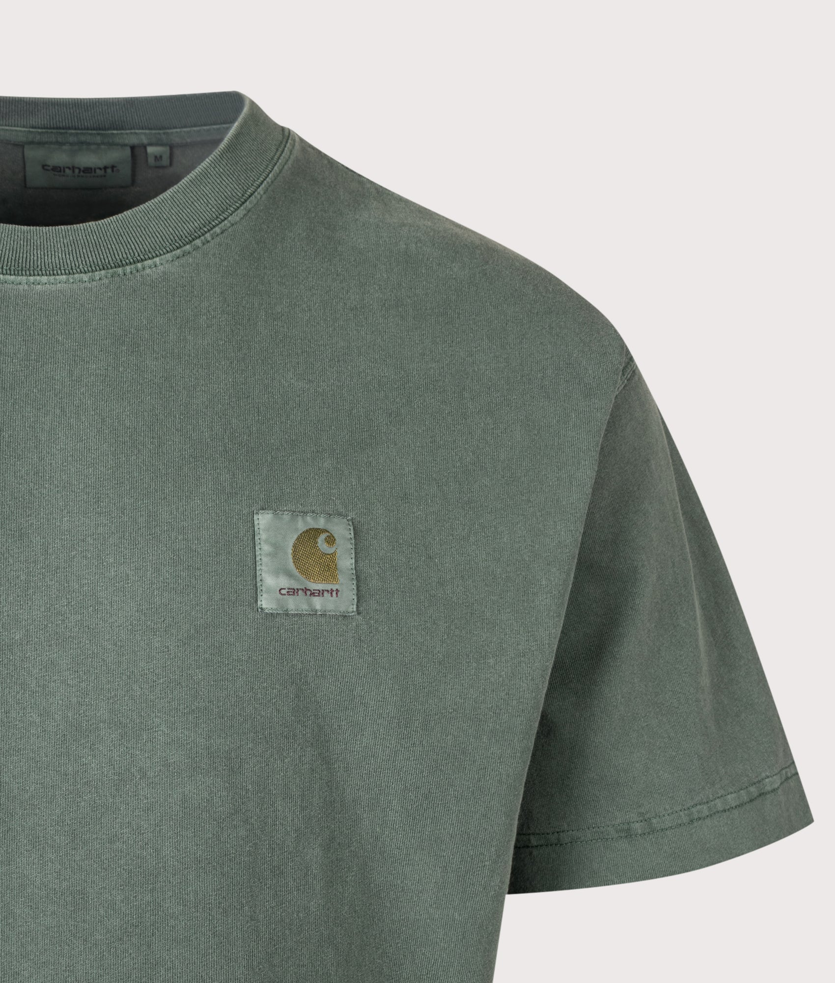 Carhartt WIP Loose Fit Vista T-Shirt in Dark Scarab at EQVVS Menswear. Detail shot.