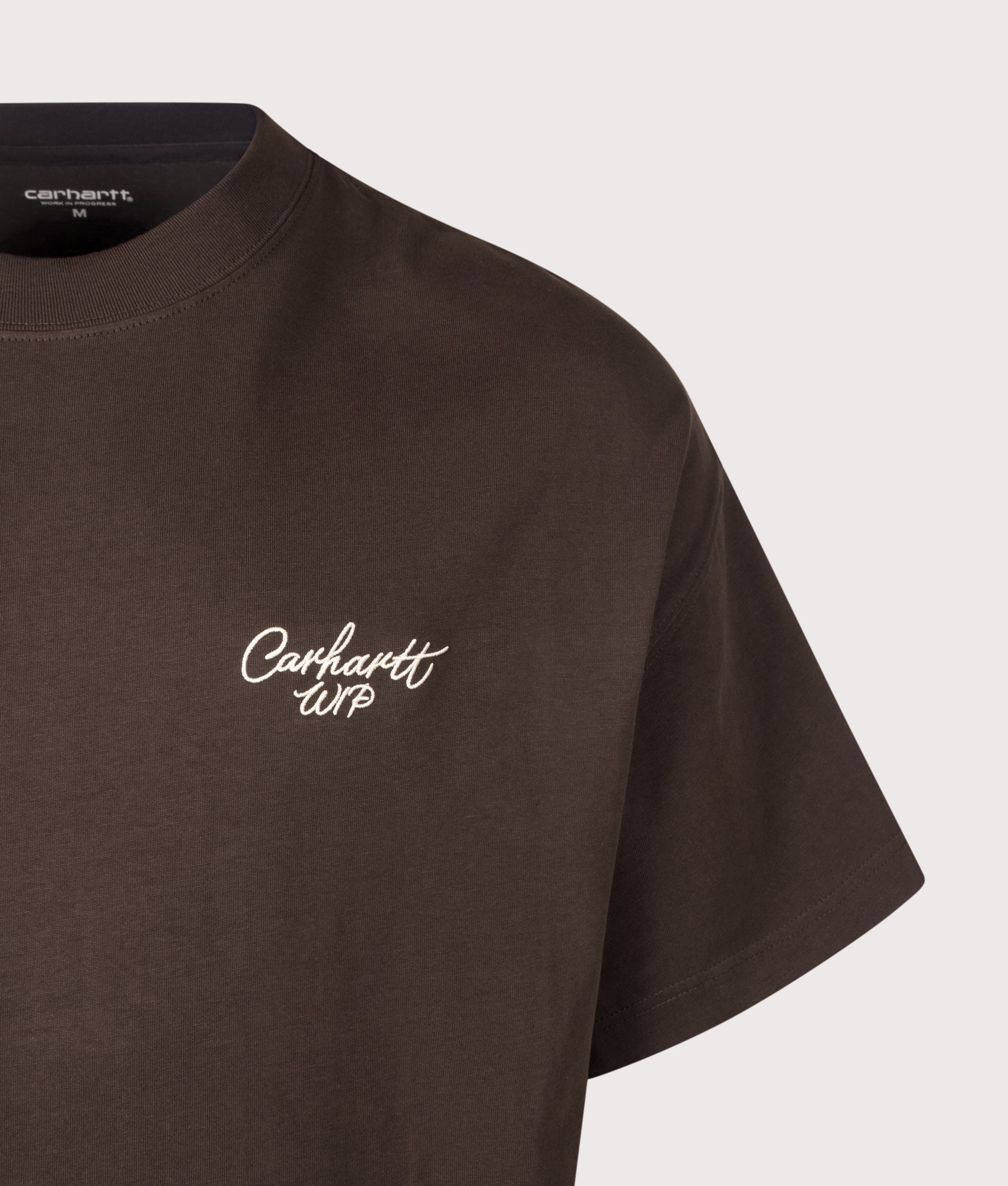 Carhartt WIP Boxy Loose Fit Signature Script T-Shirt in Tobacco and Natural at EQVVS Menswear. Detail shot.
