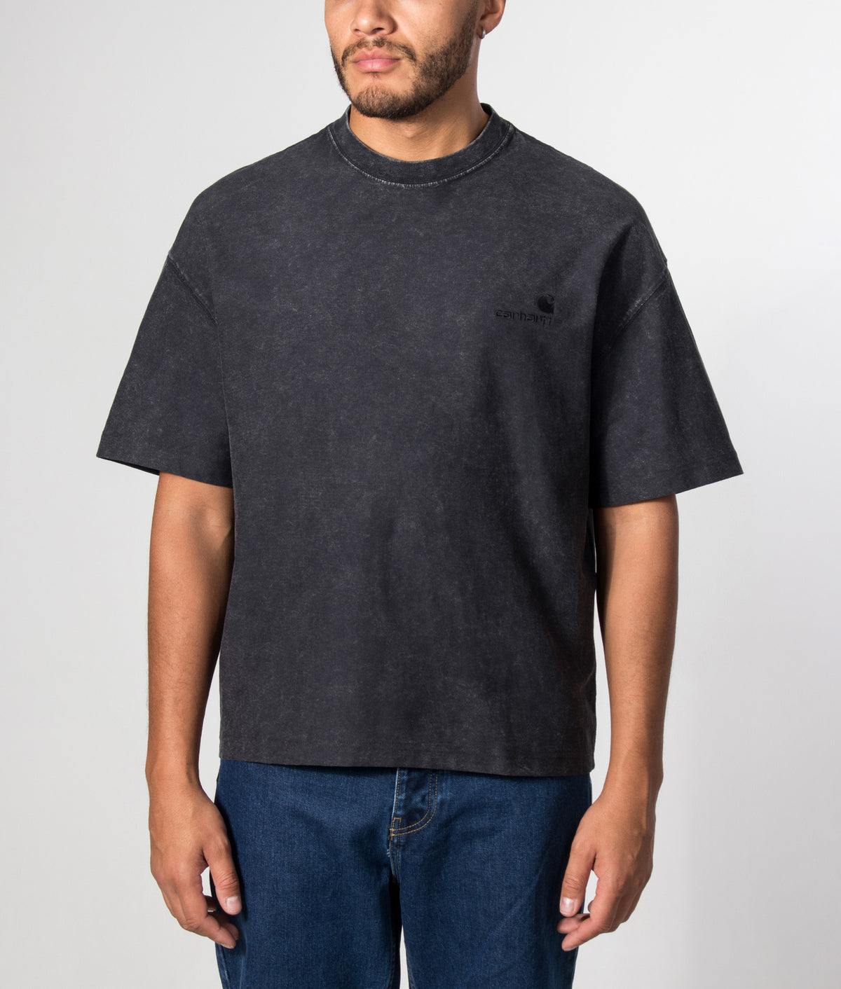 Carhartt WIP Boxy Loose Fit Lambert T-Shirt in Black Moon Wash at EQVVS Menswear. Model front shot.