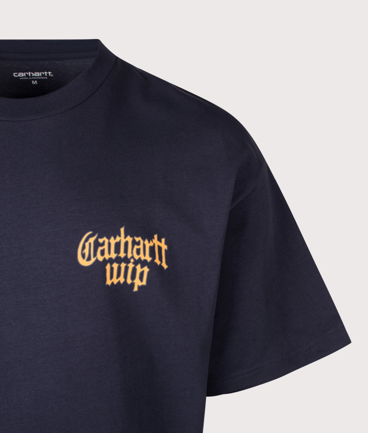 Carhartt WIP Oversized Fit Blackletter T-Shirt in Dark Navy at EQVVS Menswear. Detail shot.
