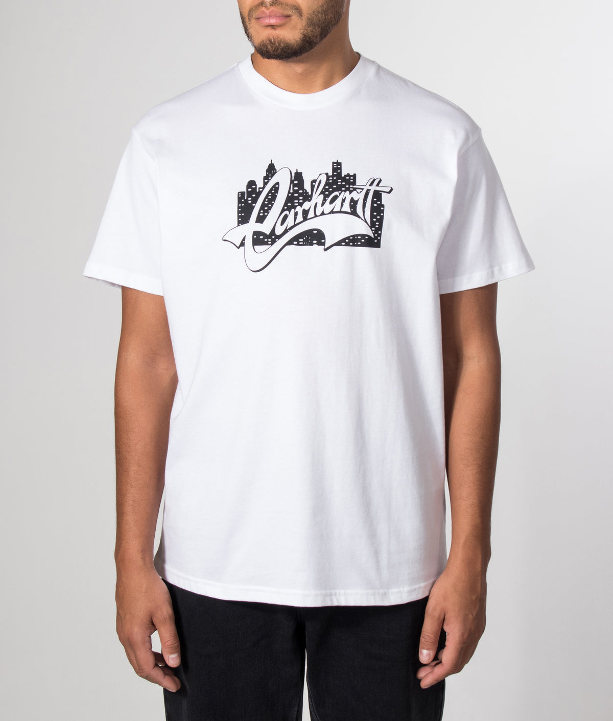 Carhartt WIP Loose Fit Boogie Night T-Shirt in White at EQVVS Menswear. Model front shot.